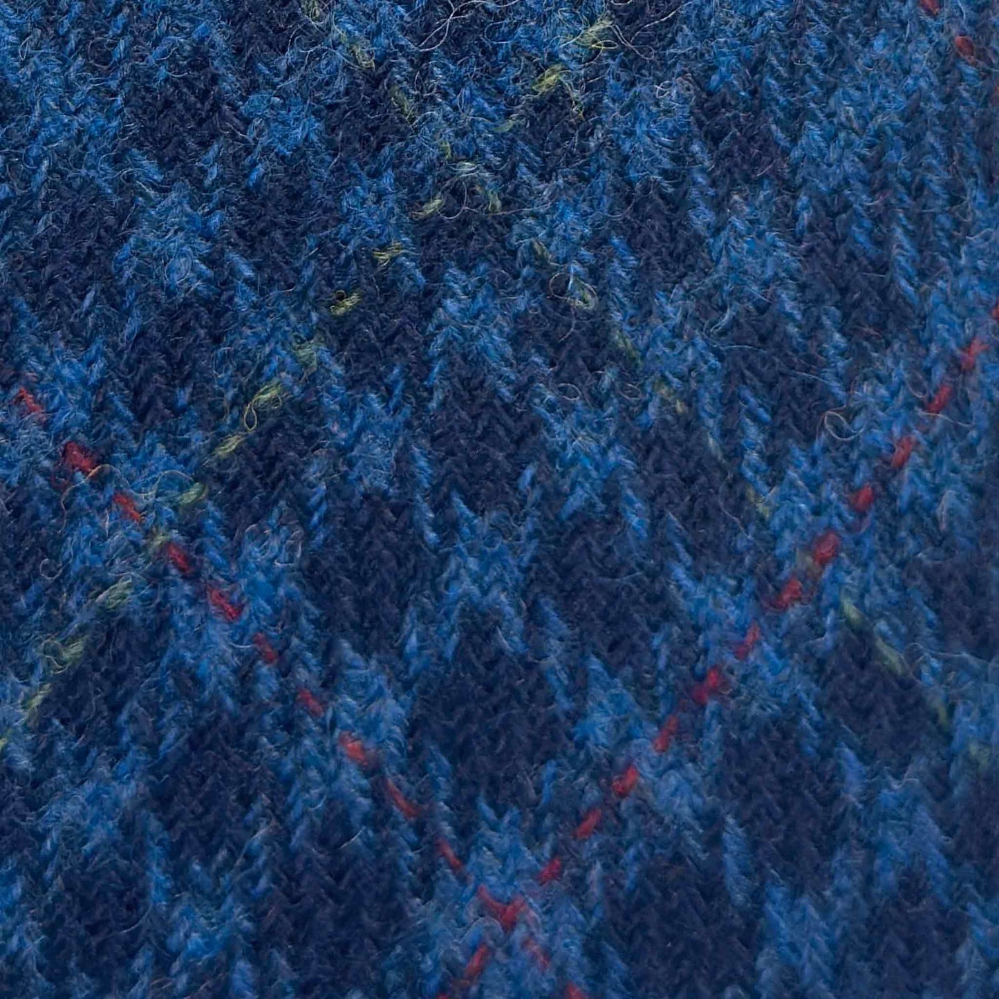 Refined prince of wales wool tie made with soft tweed wool fabric, cobalt and navy blue clors, discover at Wools Boutique Uomo men's ties store in Geneva