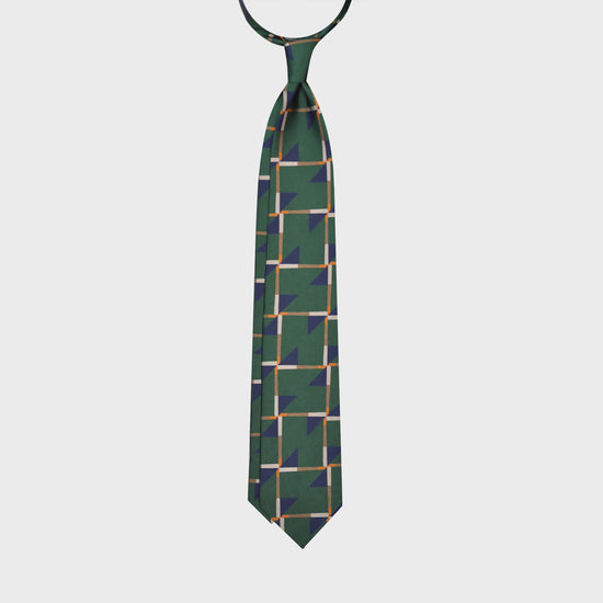 Refined deco tie made with finest Italian silk soft to the touch, grass green background with cobalt blue and beige Art Decò pattern, unlined tie 3 folds, this Art Deco ties is made with a exclusive pattern made by Wools Boutique Uomo