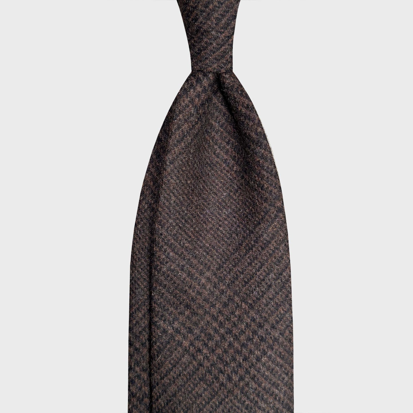 Men's Prince of Wales Wool Tie Unlined Coffee Brown. Refined untipped wool tie, coffee brown prince of wales wool tie ideal for a regular knot, handmade Italian flannel ties Wools Boutique Uomo Geneva collection