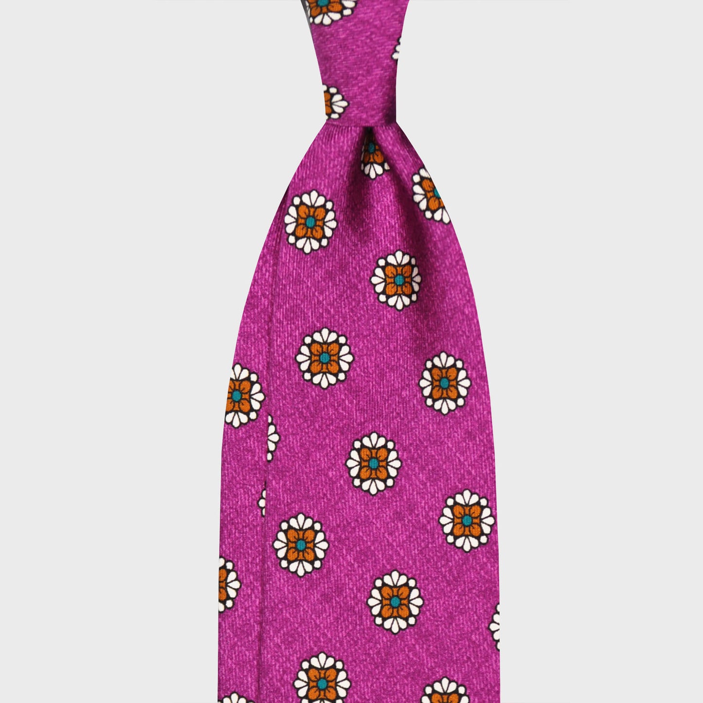 Royal Fuchsia Silk Tie Unlined Diamonds Flower Pattern. Silk tie flamed royal fuchsia background with turquoise and white diamonds flower pattern, unlined 3 folds, handmade tie F.Marino Napoli for Wools Boutique Uomo