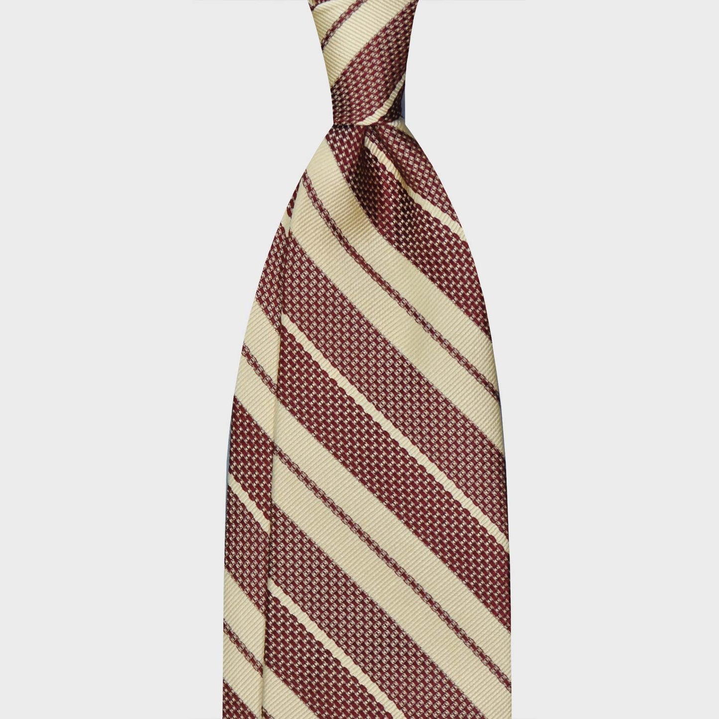 Hay Yellow Grenadine Silk Striped Tie. Regimental grenadine necktie made with grenadine and jacquard silk, hand rolled edge, unlined 3 folds, soft hay yellow background with burgundy red striped, F.Marino Napoli exclusive for Wools Boutique Uomo