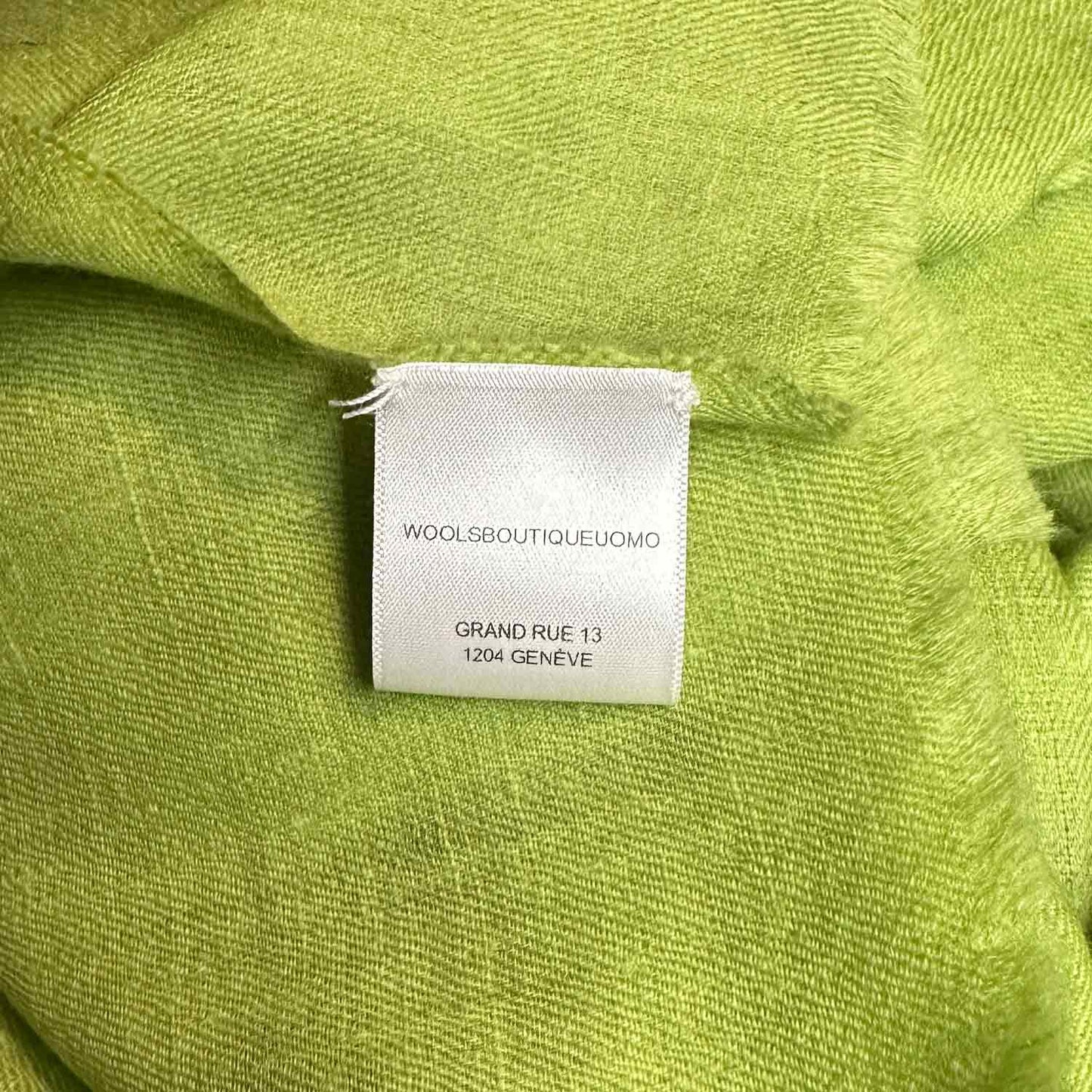 Discover the lime green cashmere scarf, exclusively crafted in Italy. Shop this luxurious mono color scarf at Wools Boutique Uomo in Geneva.