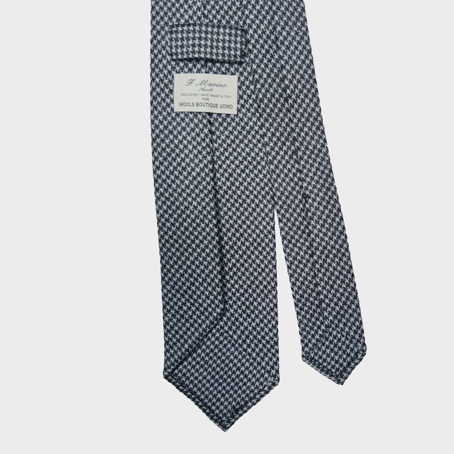 Timeless black grey pied-de-poule wool tie, unlined ties handmade in Italy available at men's store Geneva Switzerland Wools Boutique Uomo