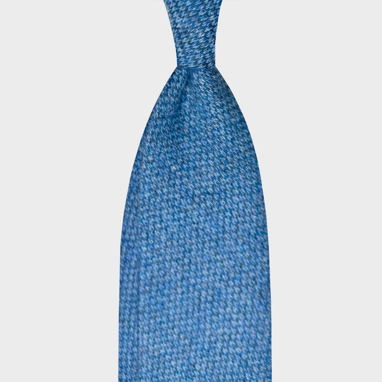 Barleycorn Tweed Sky Blue Men's Wool Tie Geneva. Exclusive wool tweed tie available at men's ties store Geneva Wools Boutique Uomo, lightweight tweed with soft touch texture, sky blue barleycorn fabric