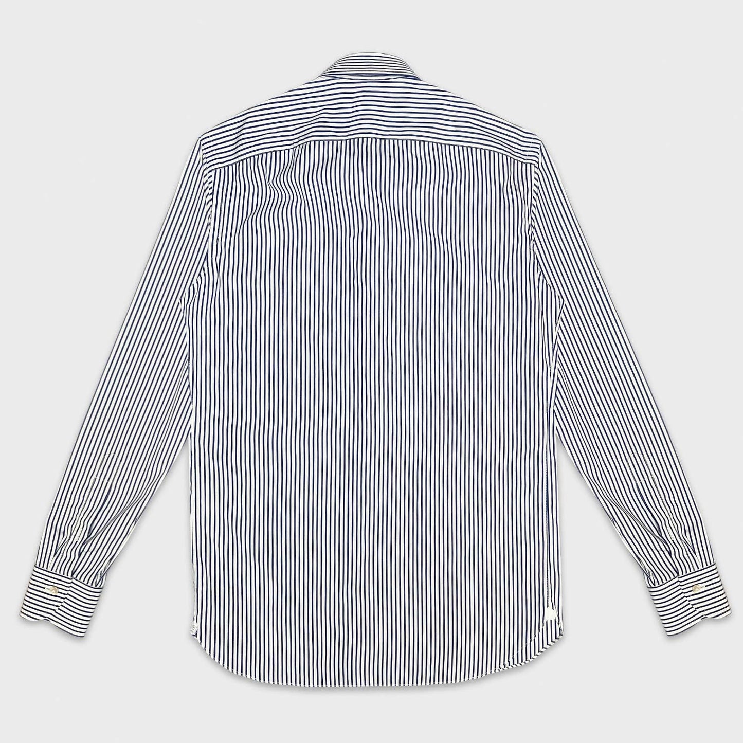 Classic blue striped shirt made with Thomas Mason fabric yarn-dyed in popeline cotton. Handmade shirt by Borriello Napoli exclusive for Wools Boutique Uomo, ideal both for the office and for more formal occasions with a bright appearance and a soft and smooth hand.