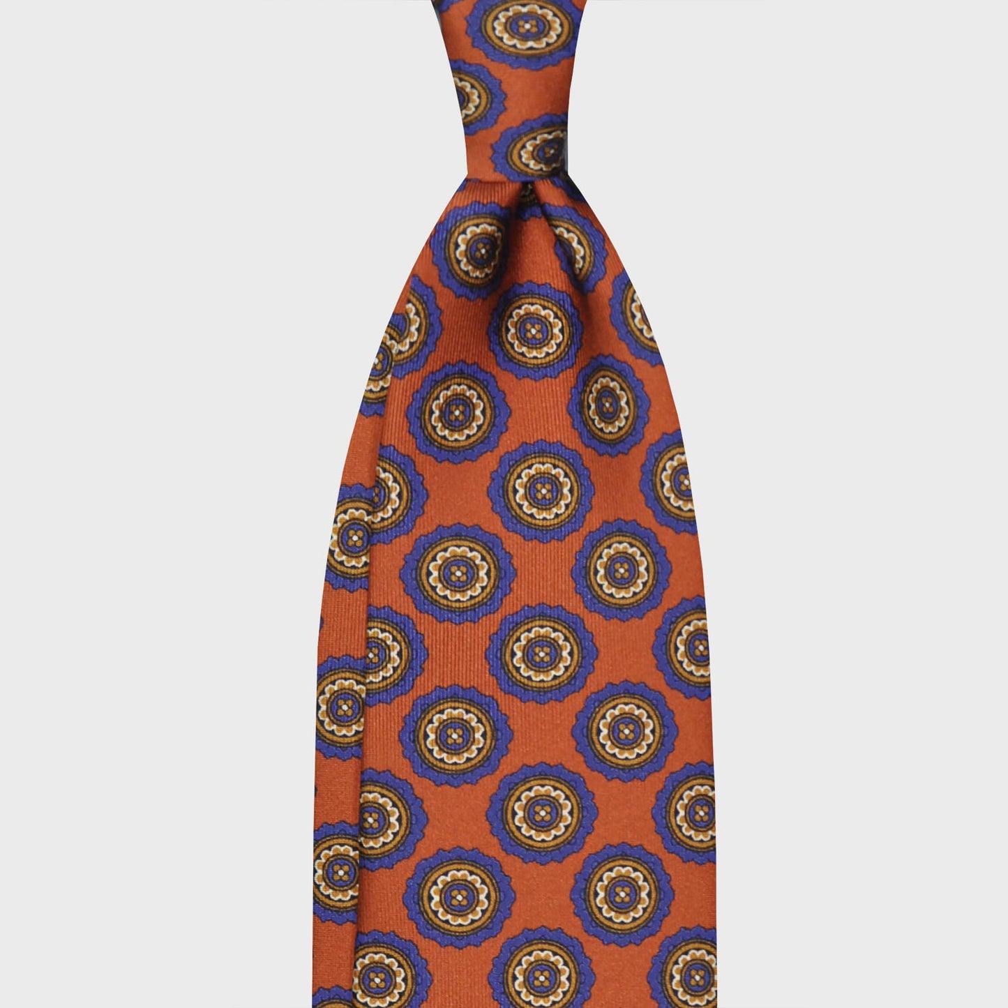 Orange Medallions Silk Tie. Men's orange silk tie made with finest Italian silk soft to the touch, unlined tie 3 folds, refined medallions printed pattern pervinca blue, classic handmade tie F.Marino Napoli exclusive for Wools Boutique Uomo