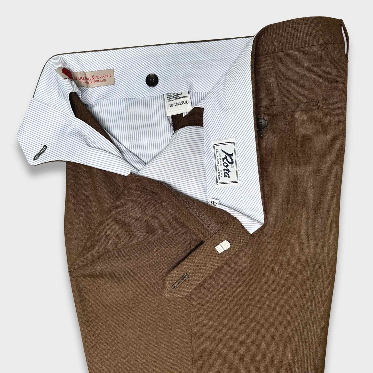 Brown Hopsack Double Pleated Wool Trousers Marling & Evans. Rota trousers hand made in Italy exclusive for Wools Boutique Uomo Genava with Marling & Evans hopsack wool fabric, moka brown color, classic double pleated