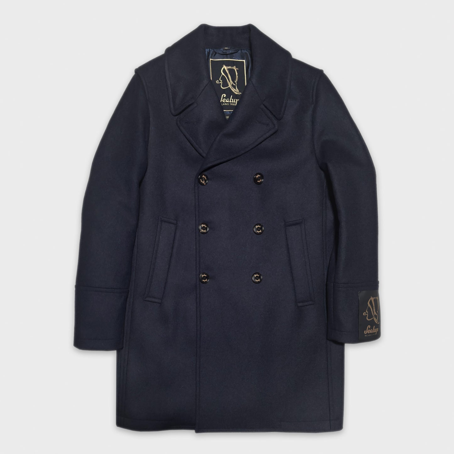 Sealup Peacoat Loro Piana Rain System Lambswool Navy Blue Caban Jacket . Discover the navy blue wool peacoat mens made with fabric by Loro Piana Rain System, water repellent peacoat, ideal to wear with formal outfits and free time, discover in Geneva menswear store
