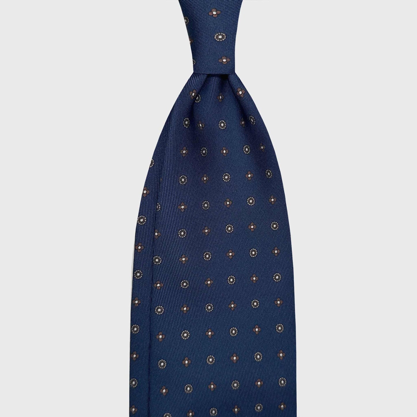 Navy Blue Silk Tie Classic Micro Flowers Pattern. Classic navy blue silk tie with brown and ivory white micro diamonds pattern, handmade silk tie F.Marino Napoli for Wools Boutique Uomo Genève