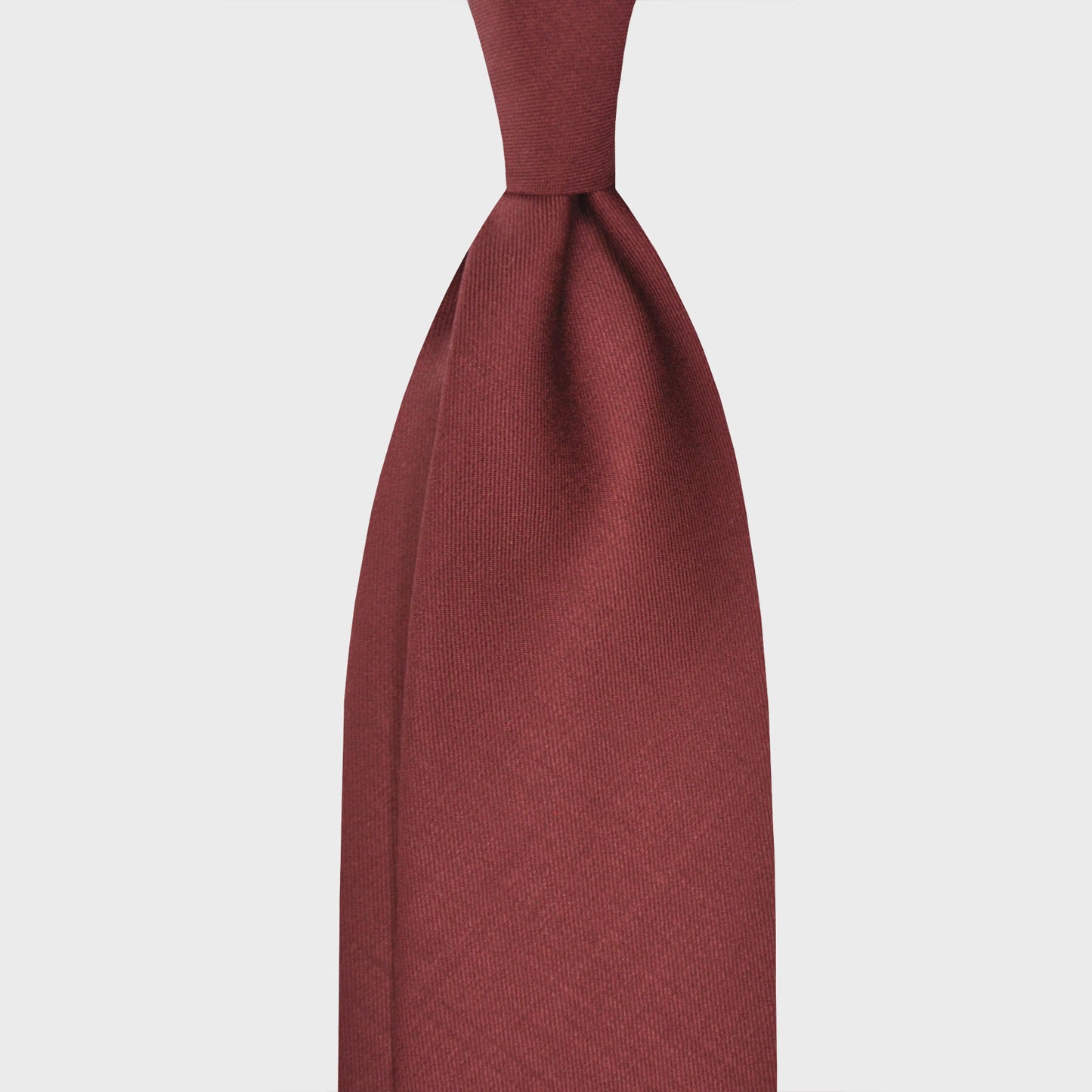 Burgundy Red Plain Tie Holland&Sherry Wool. Plain wool tie made with the Hollande & Sherry worsted wool, unlined 3 folds, soft and silky to the touch, burgundy red plain color, handmade tie F.Marino Napoli for Wools Boutique Uomo