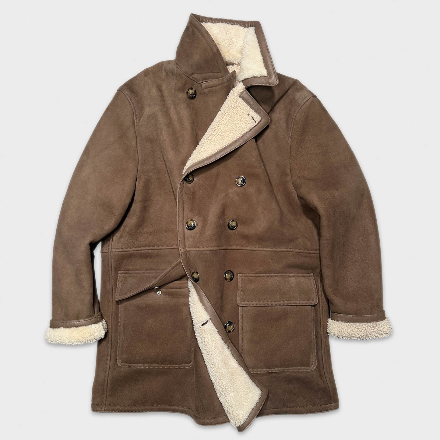 Walnut Brown Lamb Shearling Peacoat Valstar. Add to your winter wardrobe our luxury walnut brown shearling peacoat, crafted in Italy by Valstar with the finest peacoat shearling leather Geneva