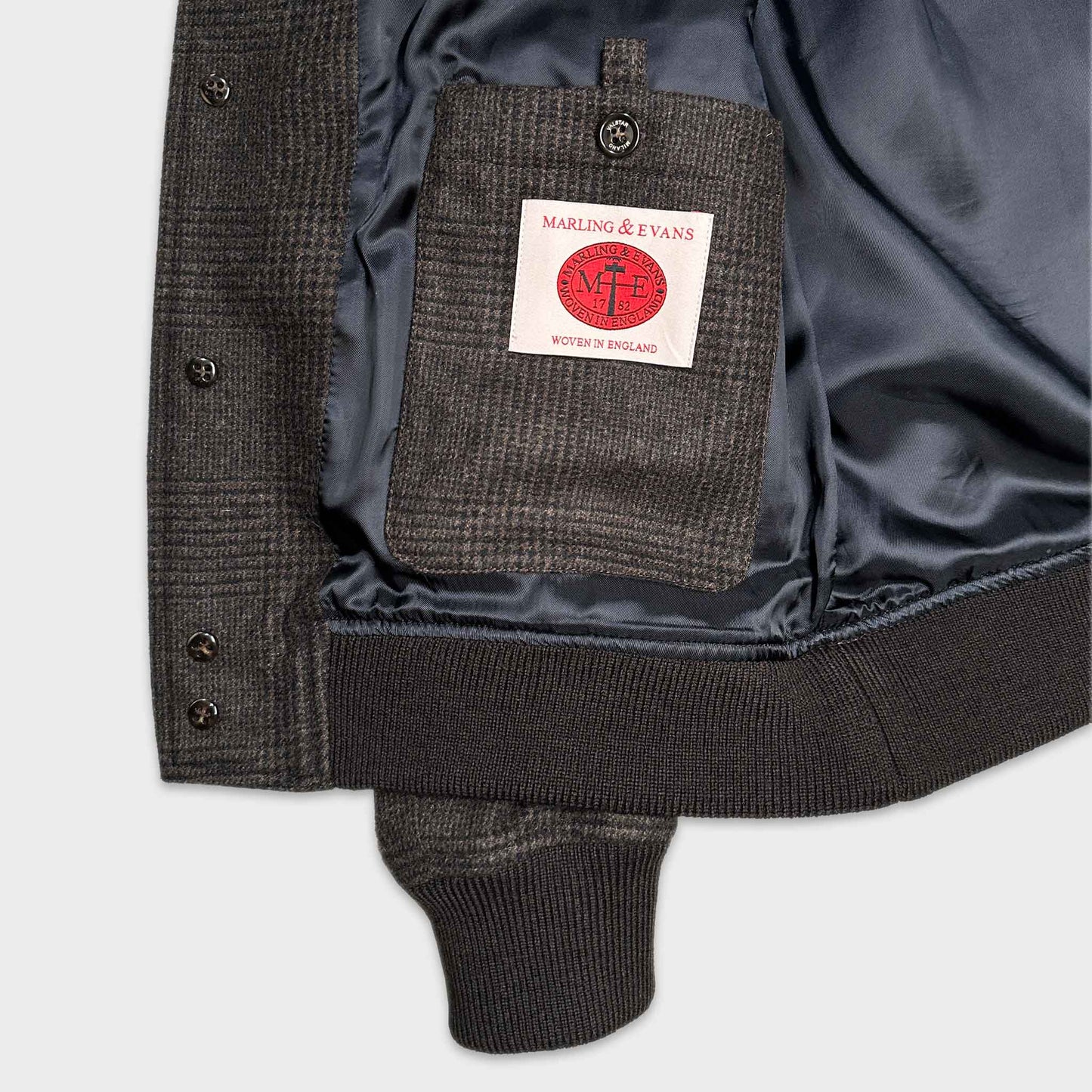 Shop now in Geneva the men's prince of wales bomber jacket Valstarino made in Italy by Valstar Milano 1911 with flannel wool fabric Marling & Evans