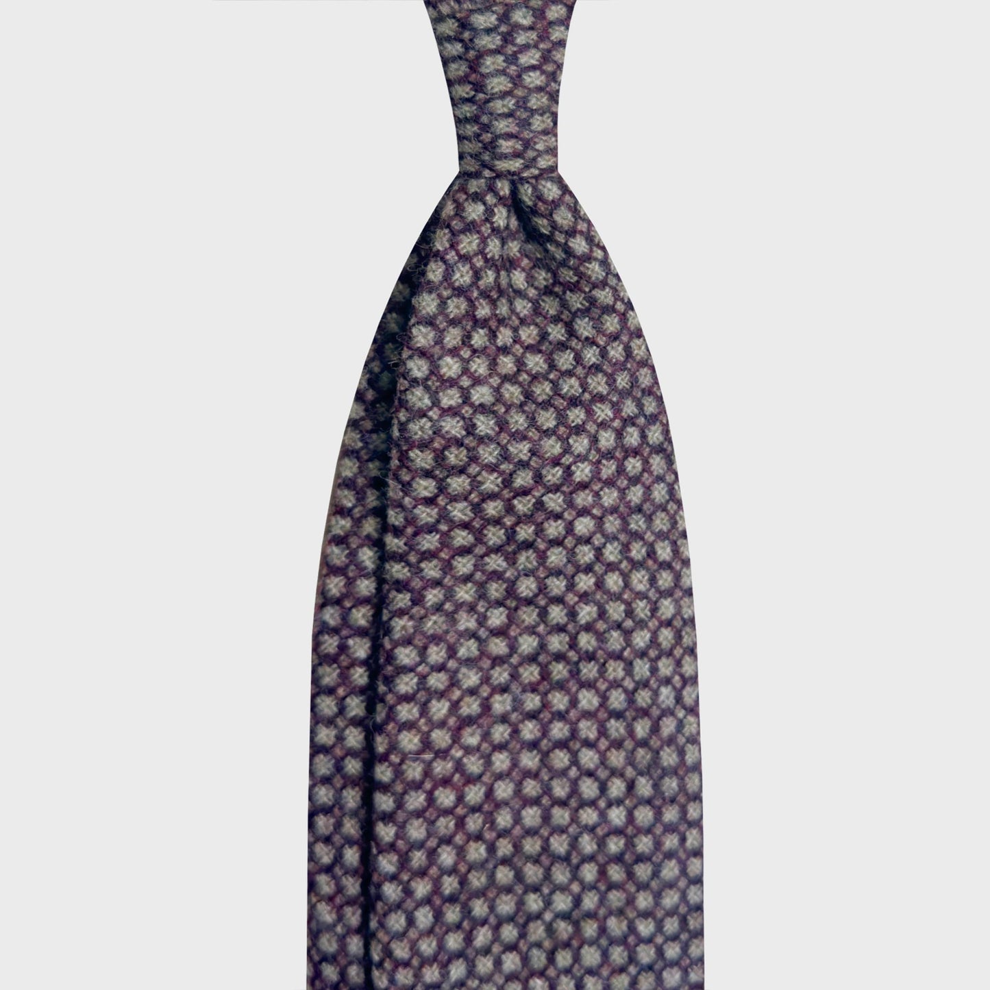 Purple Wool Tie Honeycomb Pattern Discover at Men's Store in Geneva Refined wool purple tie made with refined wool honeycomb, soft to the touch, smoke grey and purple honeycomb pattern, discover at best shop for ties geneva