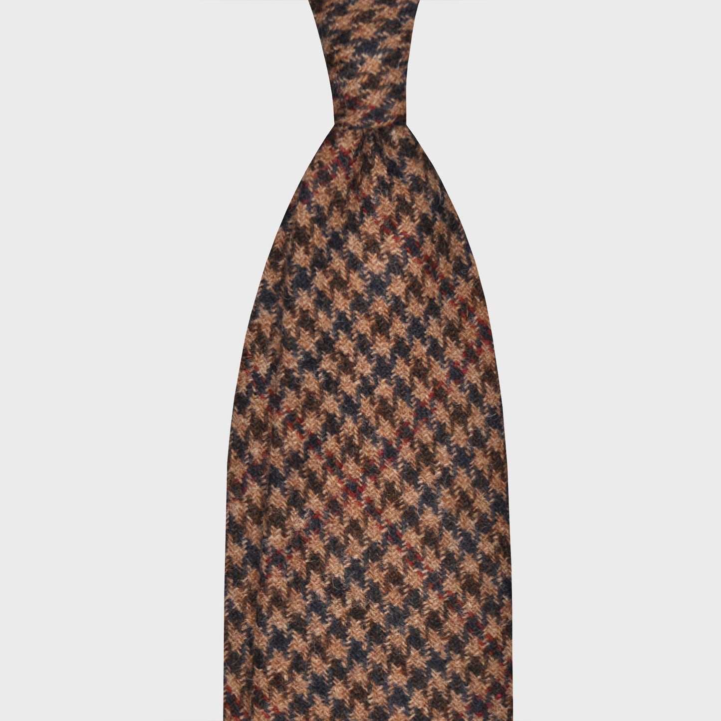 Brown Tweed Wool Tie Hand Made in Italy. Exclusive wool tweed tie F.Marino for Wools Boutique Uomo Genève, camel brown background, dark brown and navy blue pied de poule pattern, red windowpane
