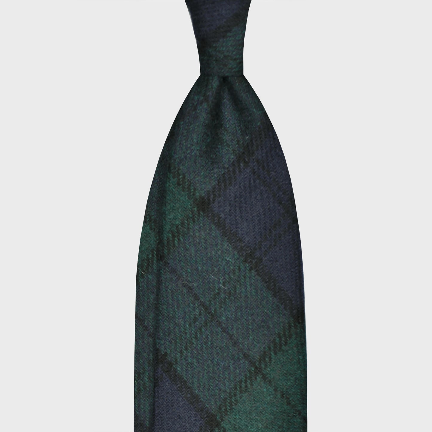 Green Black Watch Tartan Wool Tweed Unlined Handmade Tie. Iconic black watch tartan tweed wool tie green color, exclusive men's store geneva swiss , light tweed soft texture to the touch, tie shop geneva switzerland
