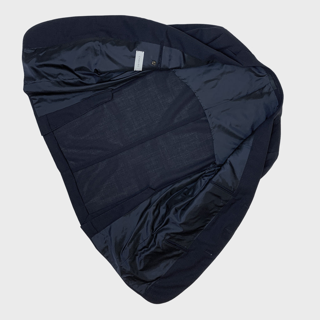 Classic navy blue men suit made in Italy by Caruso for Wools Boutique Uomo Geneva, made with 100% hopsack wool 130's ideal for spring summer seasons.