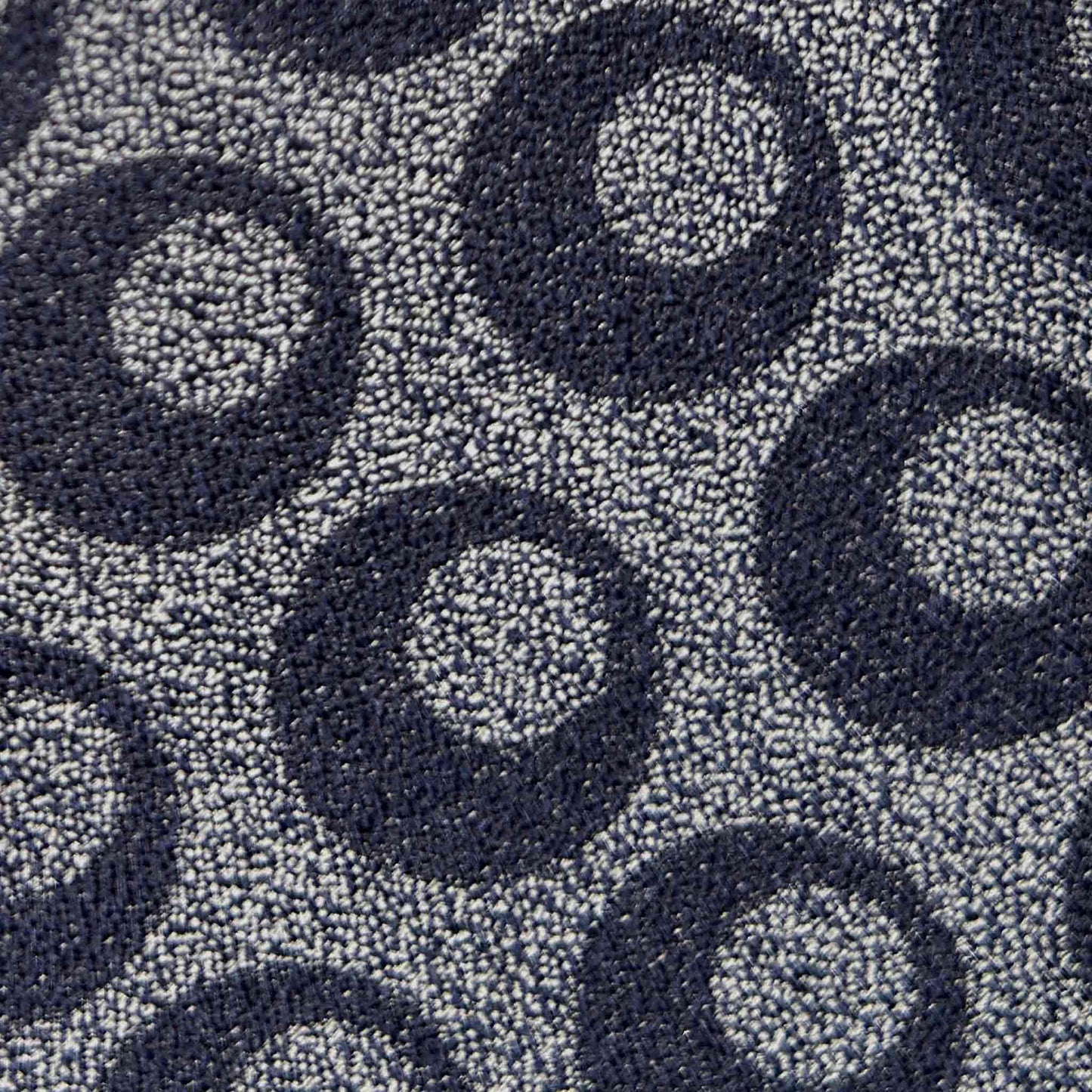Detail of Art Decò geometric pattern on F.Marino silk tie in navy blue and silver melange.