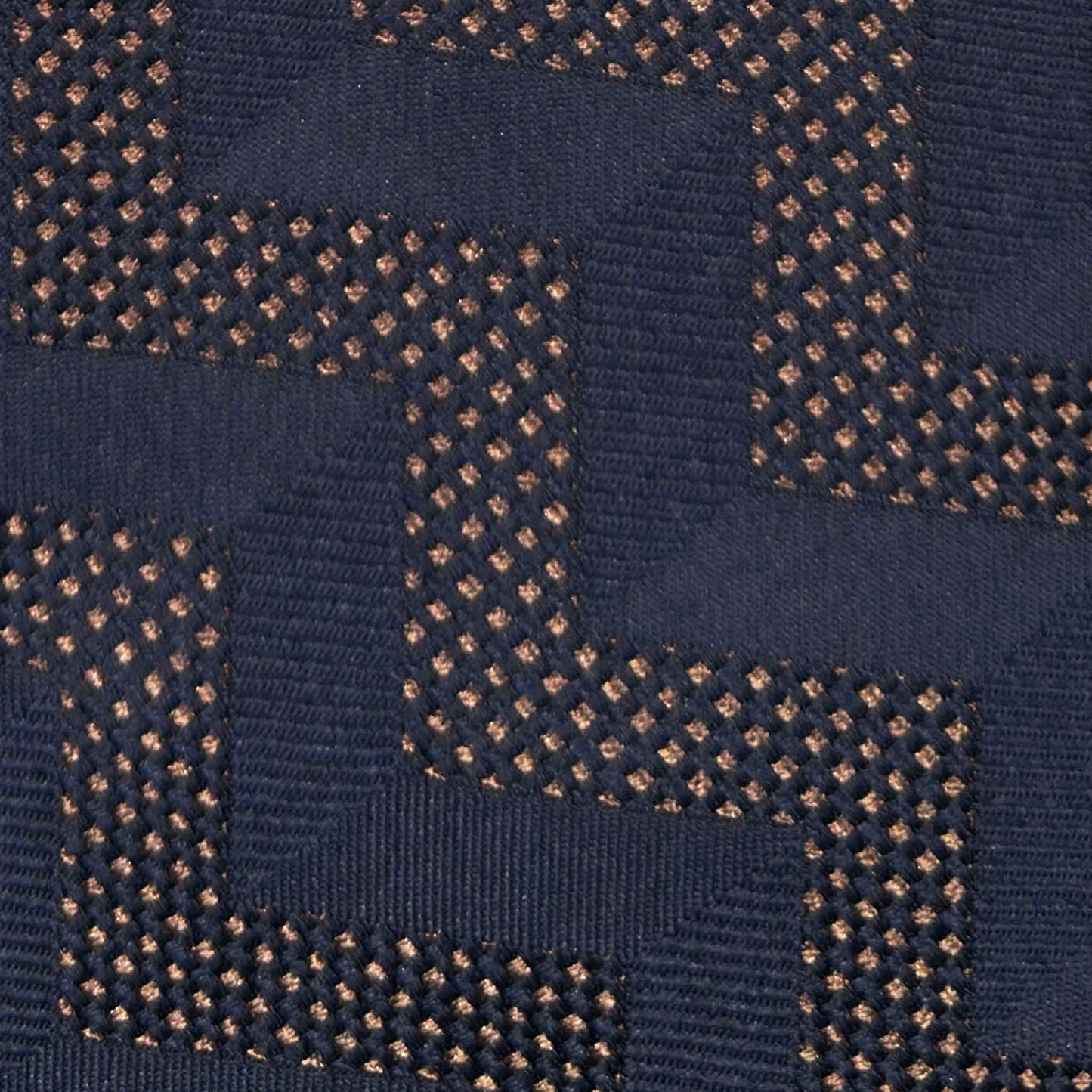 Art Déco zig zag geometric pattern detail on navy blue silk tie