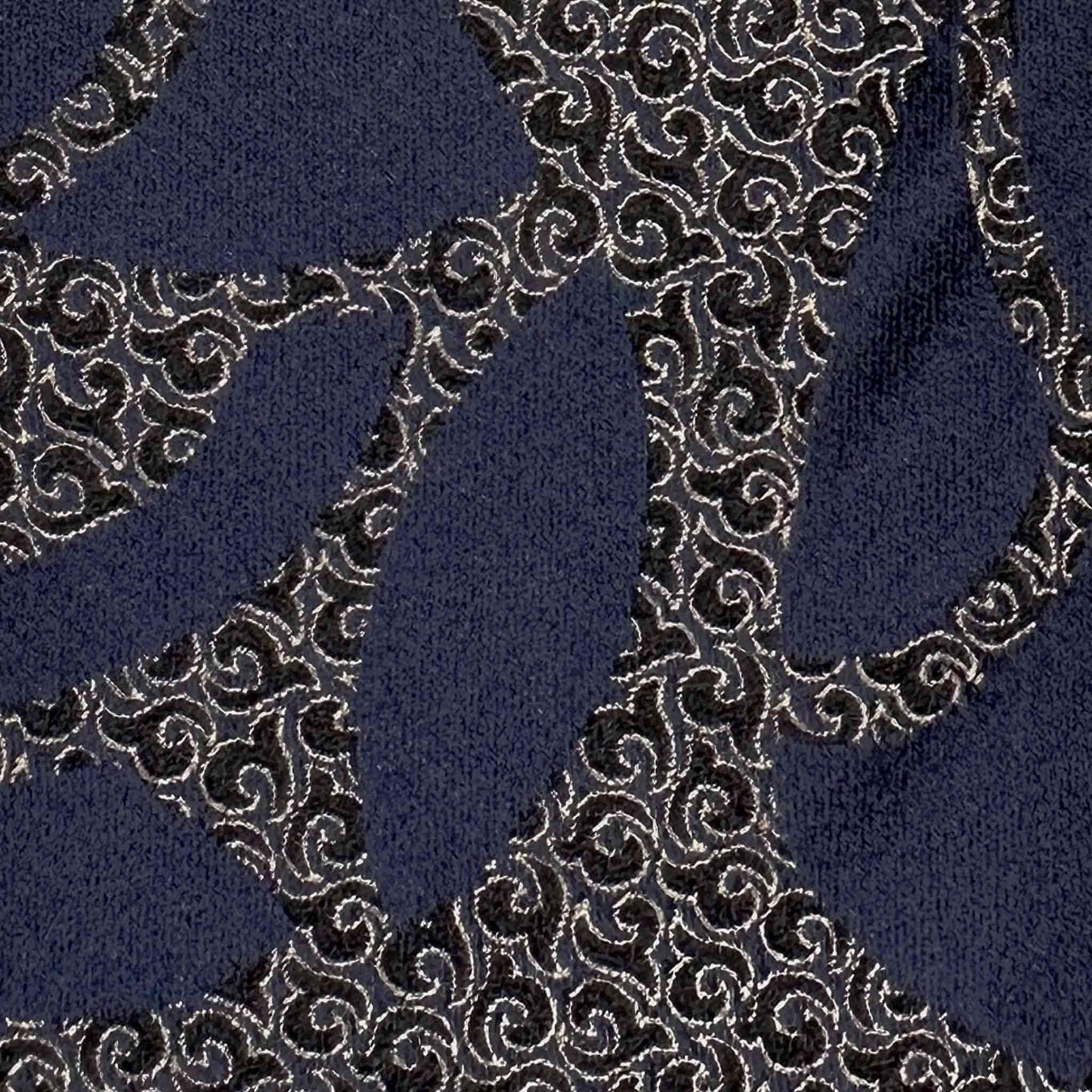 Navy blue silk tie with Art Deco scrollwork pattern and ivory detailing