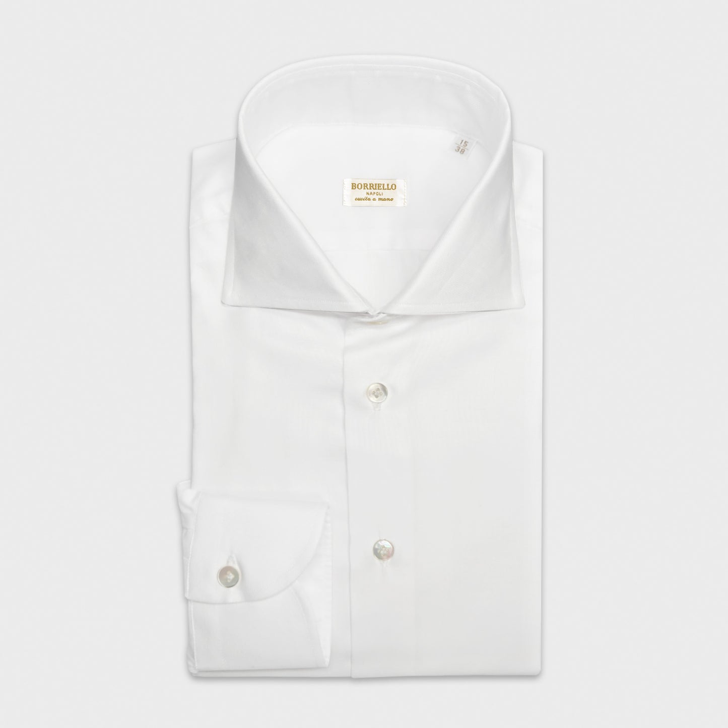 White Oxford Cotton Shirt Borriello Napoli. Classic handmade shirt ideal for the office and for more formal occasions, made in soft and refined oxford cotton double twisted, white formal shirt, handmade buttonholes, mother of pearl buttons.