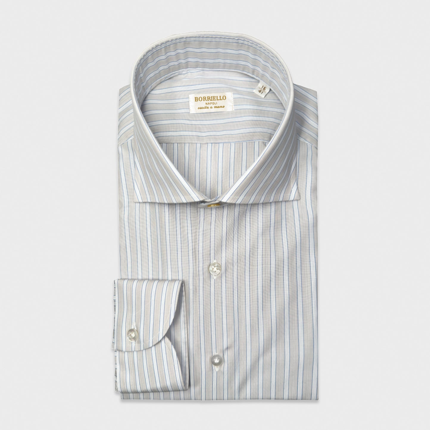 Light Sand Beige Double Twisted Popeline Striped Cotton Shirt. Elegant striped poplin shirt with light sand beige background and cobalt blue stripes. Handmade in Italy by Borriello Napoli for Wools Boutique Uomo Geneva.