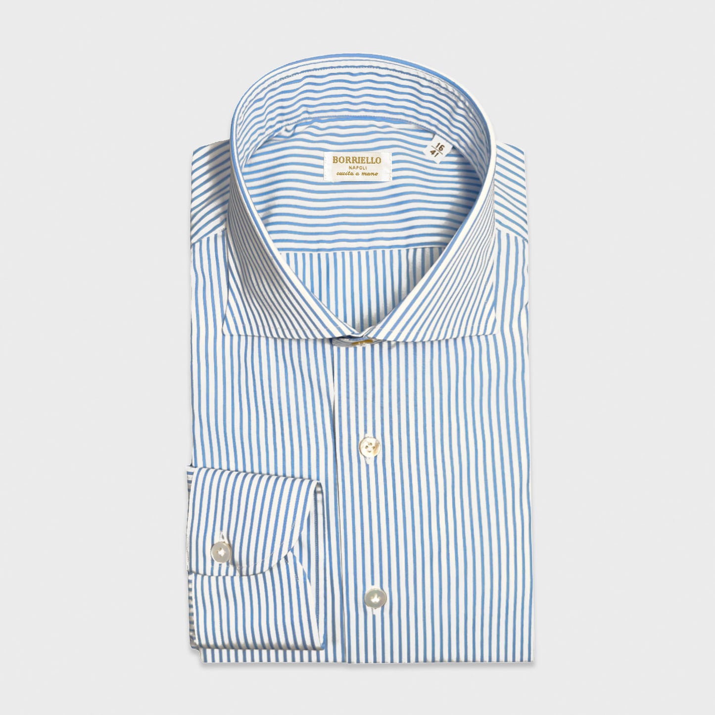 Double Twisted Striped Poplin Shirt Sky Blue Handmade in Italy. Classic striped poplin business shirt in sky blue crafted from double twisted cotton. Handmade in Italy by Borriello Napoli for Wools Boutique Uomo Geneva.