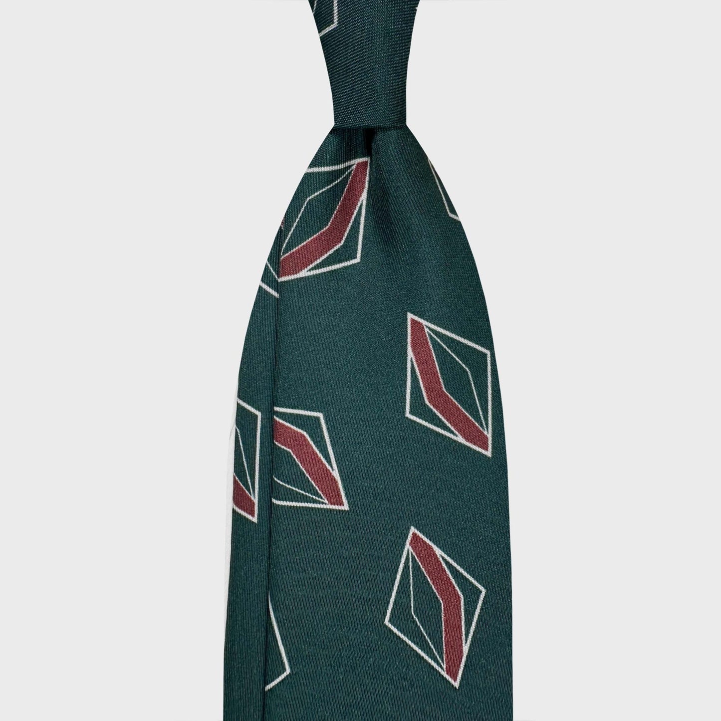 Forest Green Silk Tie Art Deco Rhombus Geometric Pattern. Green silk tie handmade in Italy ideal for a refined mens outfit, exclusive Art Deco rhombus geometric pattern in red and white tones