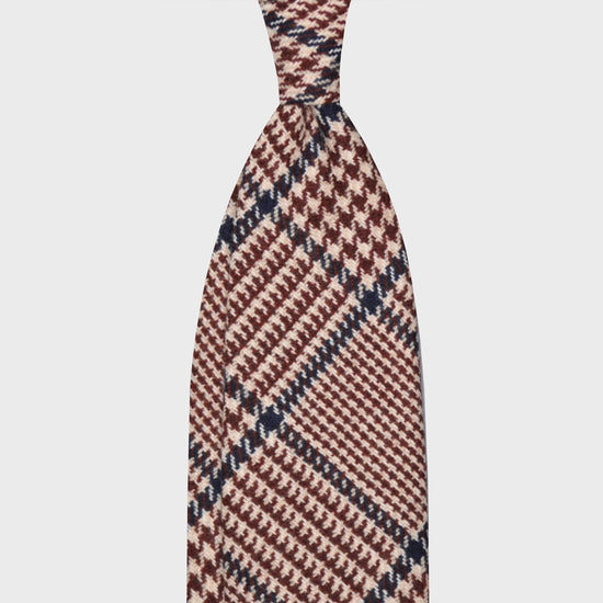 Coffee Brown Wool Tweed Gun Club Unlined Handmade Tie. Tweed wool ties , F Marino ties for Wools Boutique Uomo, light tweed soft texture to the touch, 3 folds, ivory white and coffee brown background, denim blue windowpane