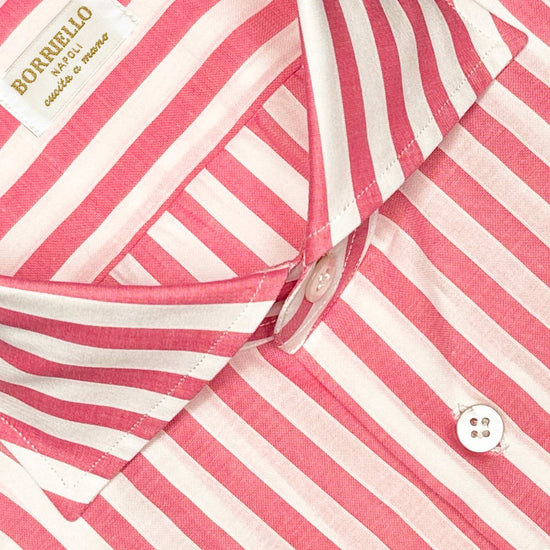 Refined handmade shirt with brillant color carmine pink, ideal both for the office and for more formal occasions with a bright appearance and a soft and smooth hand. Handmade by Borriello Napoli exclusive for Wools Boutique Uomo made with a refined yarn-dyed fabric in light 100% muslin cotton.