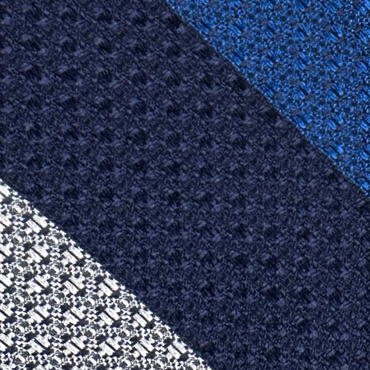 Detail open weave texture electric blue navy grenadine tie