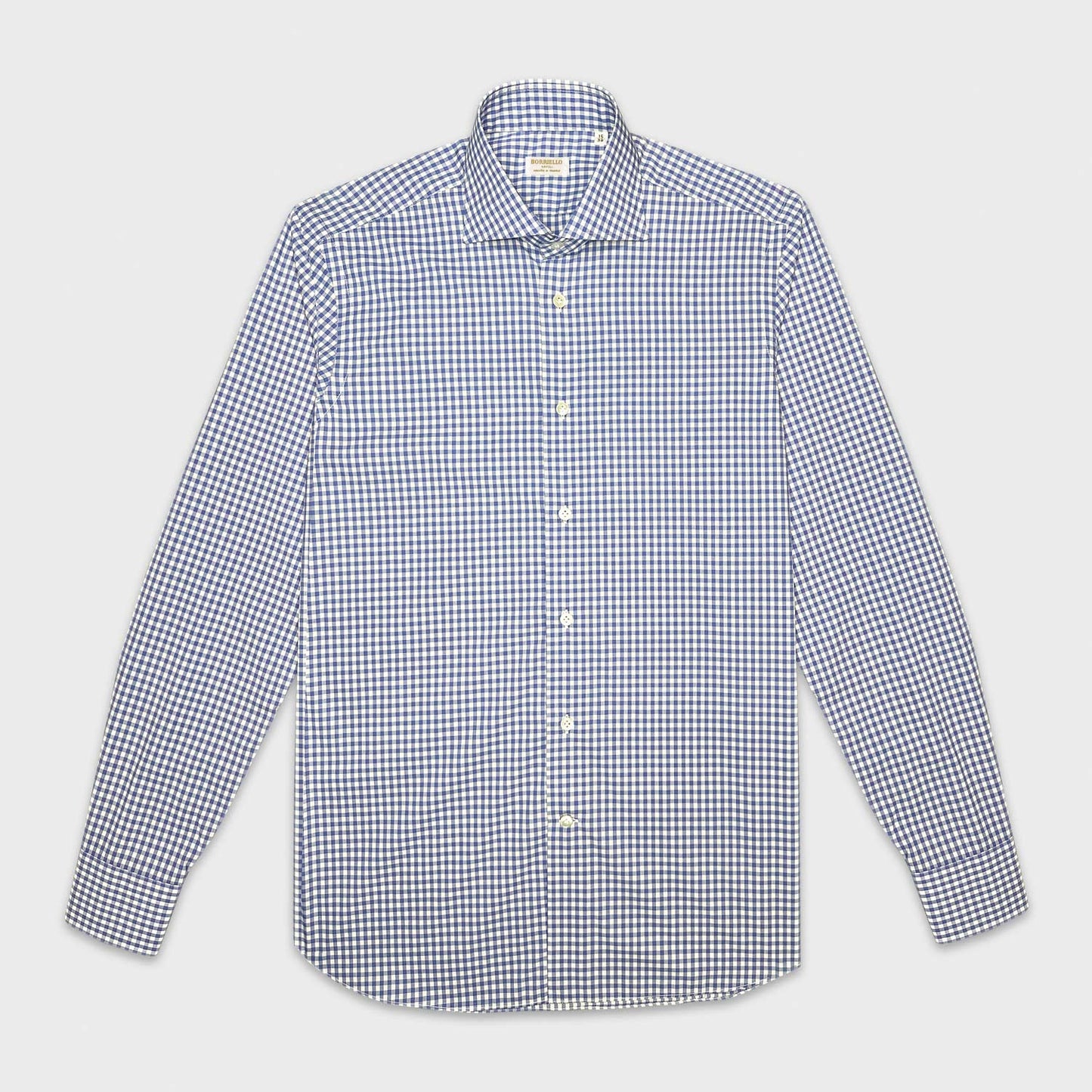 Red and blue checked shirt made with Thomas Mason fabric yarn-dyed in popeline cotton. Handmade shirt by Borriello Napoli exclusive for Wools Boutique Uomo, ideal both for the office or casual outfit with a bright appearance and a soft and smooth hand.