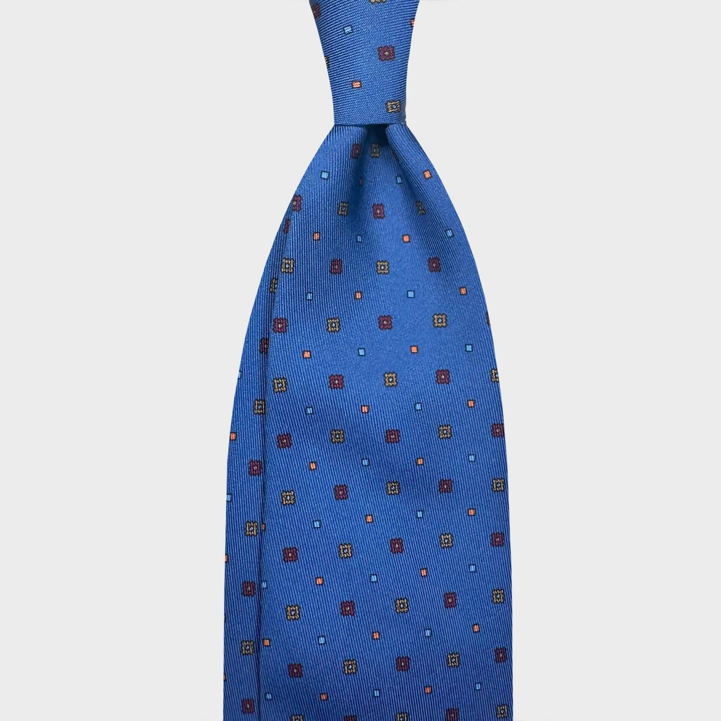Sky Blue Silk Tie Classic Micro Fantasy Pattern. Hand made blue tie, multicolor micro fantasy pattern, made in Italy sartorial ties f marino napoli for Wools Boutique Uomo Genève