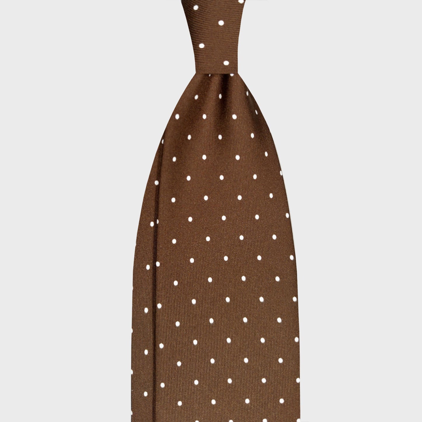 Coffee Brown Pois Men's Ties Made in Italy. Coffee brown polka dot silk tie. Developed by Wools Boutique Uomo, handmade in Italy and designed for refined tailoring, business attire and elegant menswear.