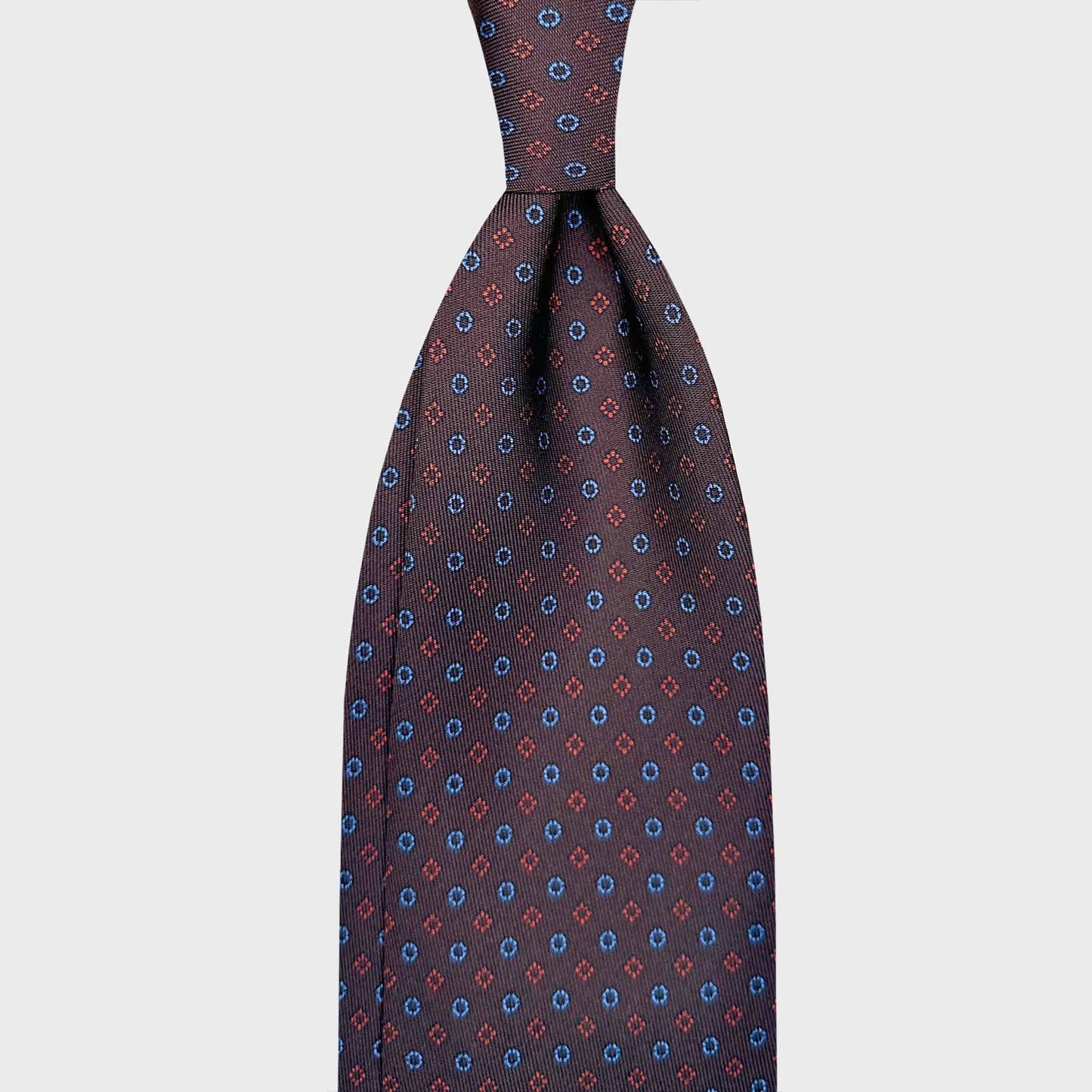 Coffee Brown Silk Tie Tailoring Classic Micro Fantasy. Coffee brown silk tie, light blue and coral red micro fantasy pattern, sartorial ties f marino napoli for Wools Boutique Uomo Geneva