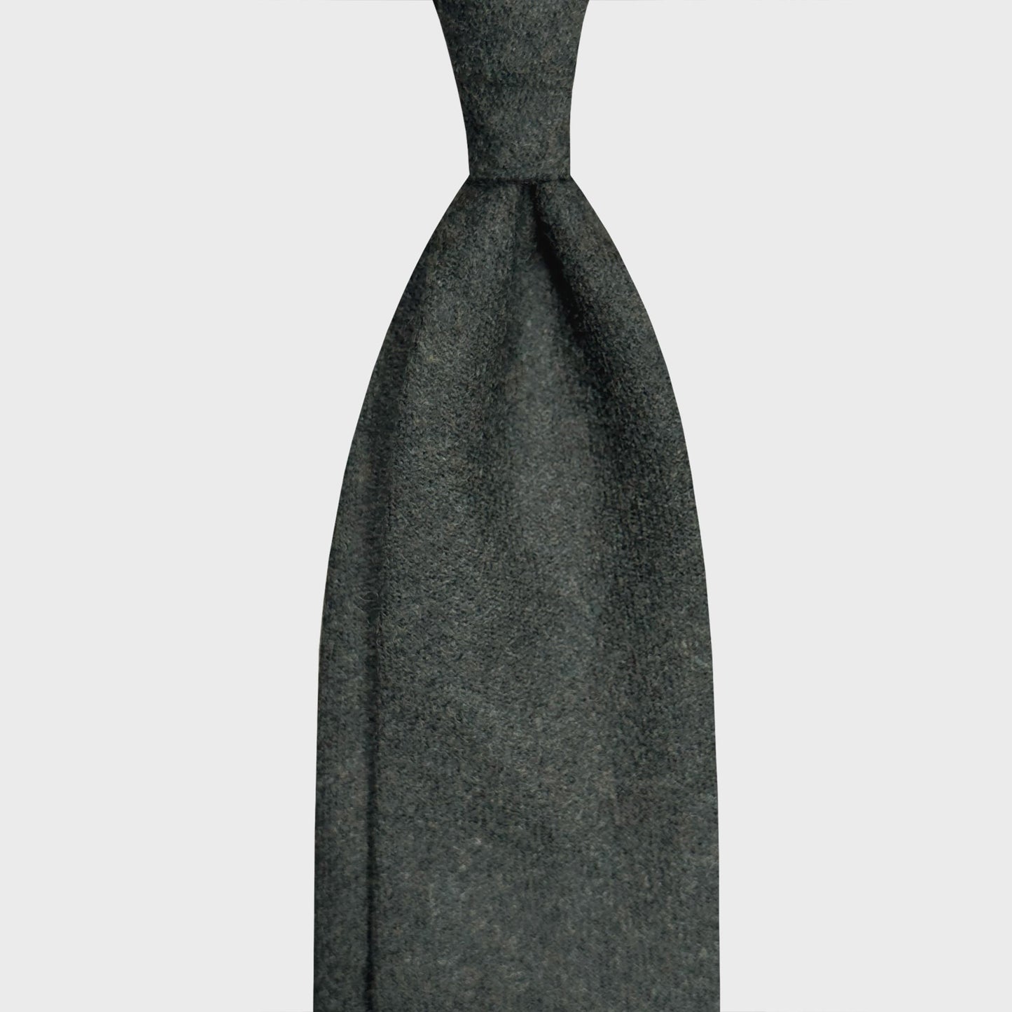 Loden Green Wool Tie Luxury Italian Handmade Men's Ties. Elegant loden green wool tie, unline wool tie ideal for a regular knot , soft fabric to the touch, handmade Italian tie collection Wools Boutique Uomo Geneva