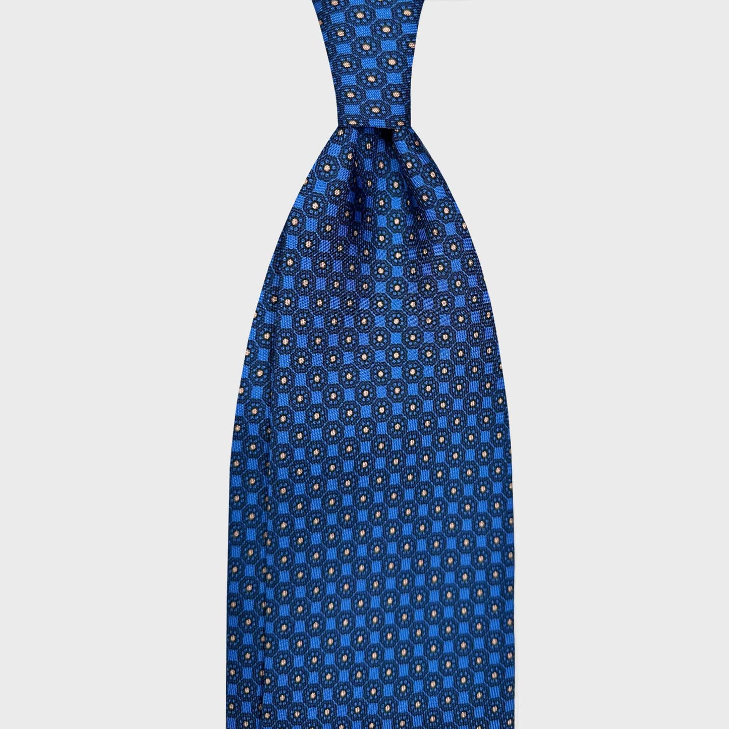 Tailoring Cobalt Blue Silk Tie Classic Micro Floral Fantasy Pattern. Refined cobalt blue silk tie, navy blue and beige micro floral daisy pattern, sartorial ties f marino napoli for Wools Boutique Uomo Geneva