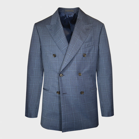 Sky Blue Windowpane Double Breasted Jacket Wool. Exclusive Caruso double-breasted wool jacket, a timeless piece available only at Wools Boutique Uomo. This sartorial jacket combines classic elegance with a touch of vintage charm with the sky blue opaque windowpane pattern adds a refined flair.