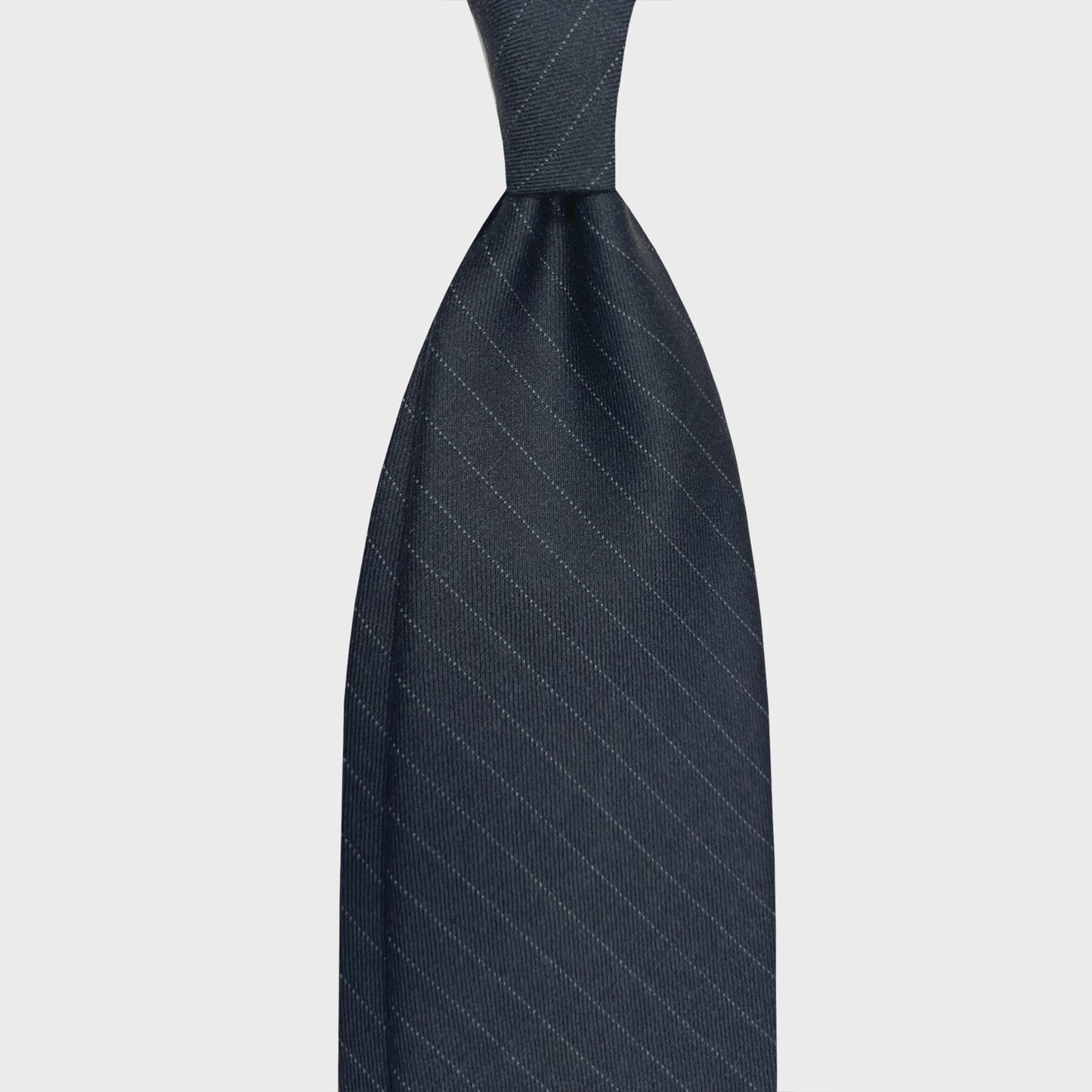 Shop Now The Exclusive Every Seasons Regimental Wool Tie Grey. Refined striped wool tie anthracite grey color with the exclusive fabric for every seasons made in Italy, explore the men's tie collection at the Geneva store