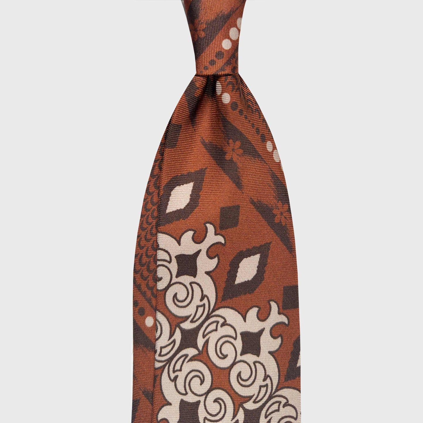 Cinnamon Brown Silk Tie Retro Baroque Design 70s. Silk tie inspired by retro baroque design, featuring rich cinnamon brown, beige and rust tones. Handmade in Italy for those who appreciate timeless elegance. 