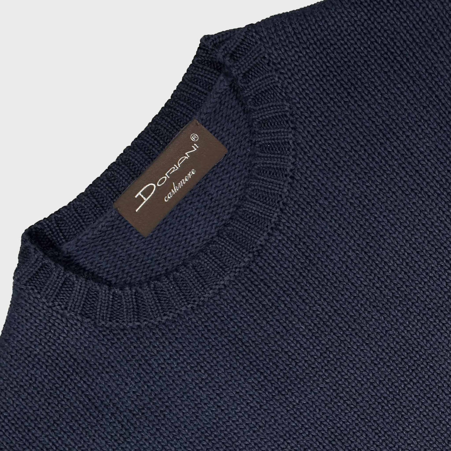 Doriani luxury navy blue cotton knit crewneck sweater with ribbed collar.