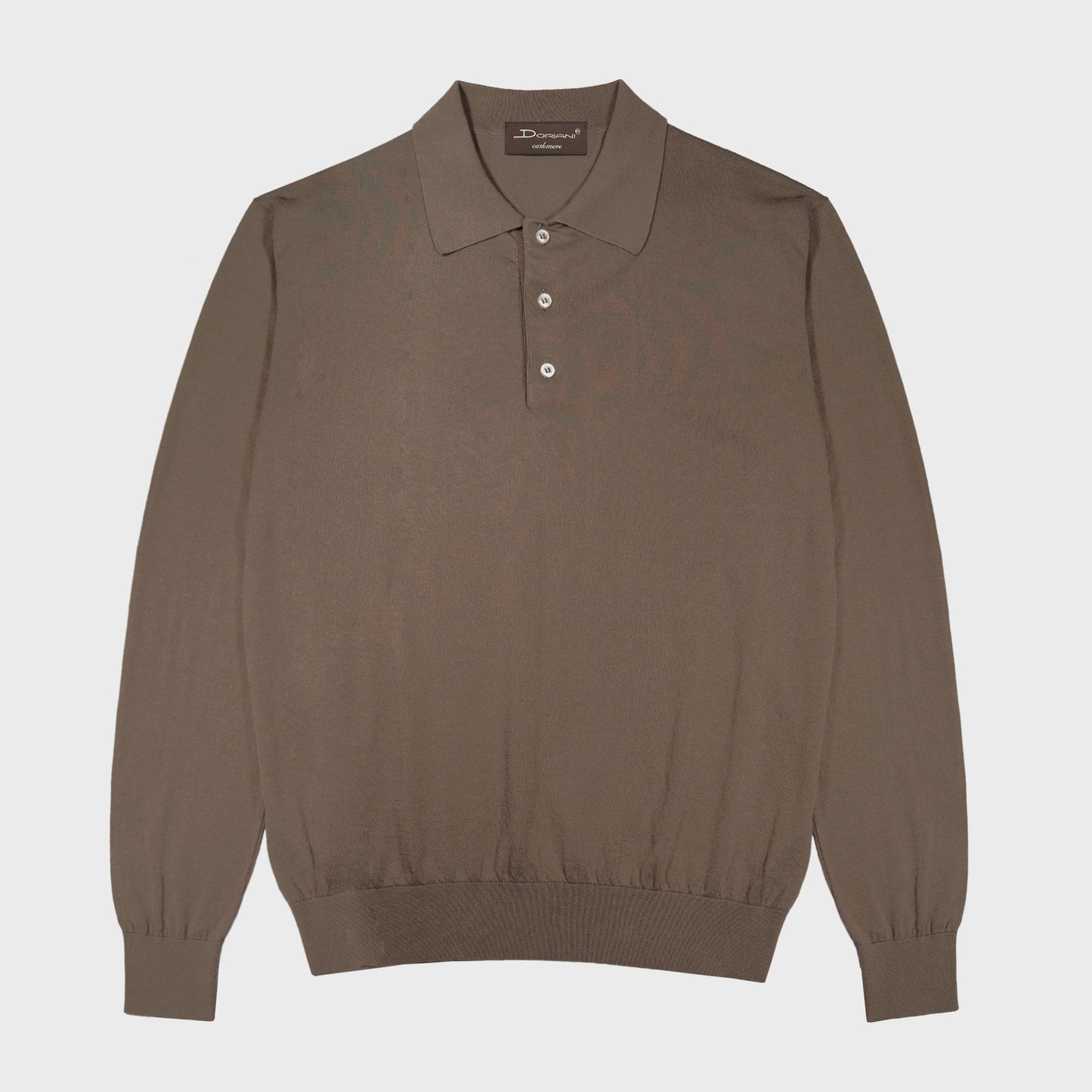 Doriani Deep Taupe Cotton Long Sleeve Polo Made in Italy. Deep taupe long sleeve polo by Doriani in lightweight 100% cotton. Soft and refined knitwear designed for relaxed tailoring and versatile everyday elegance. Selected by Wools Boutique Uomo in Geneva for its balance of comfort, versatility and understated Italian refinement.