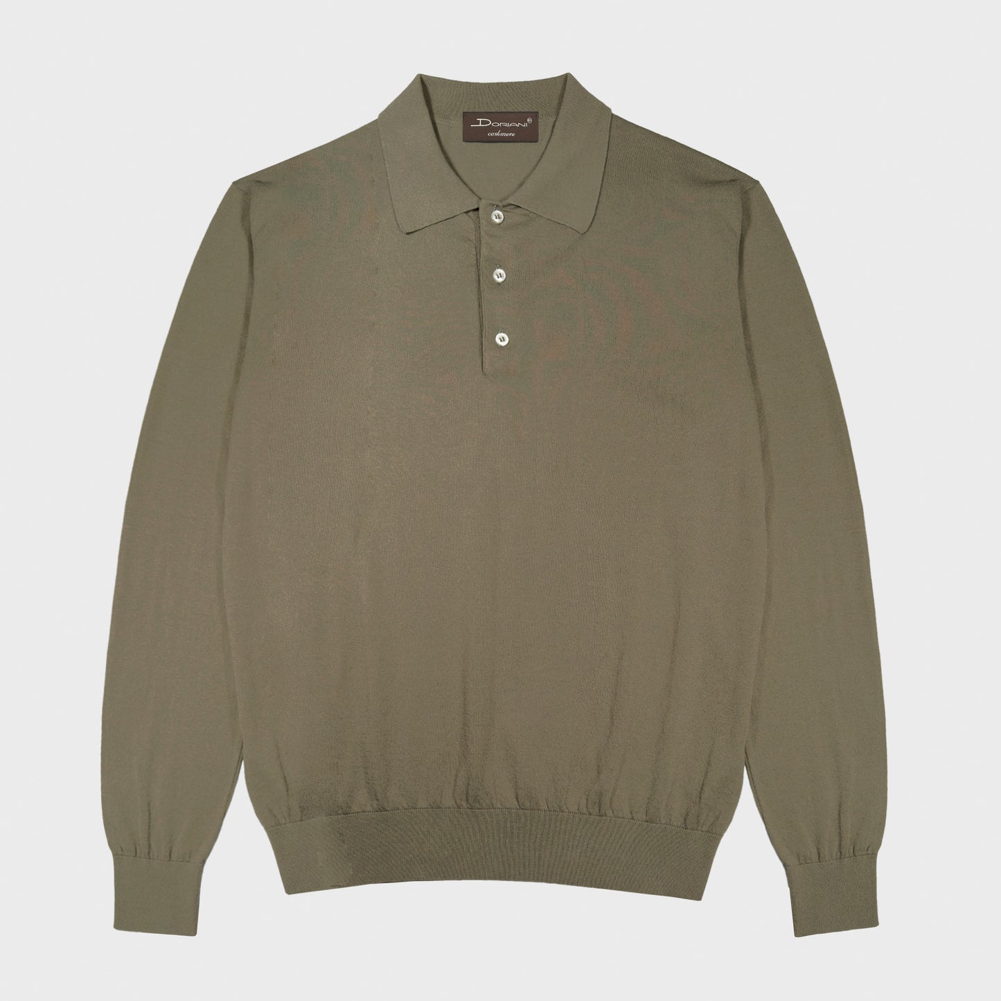 Doriani Mud Green Cotton Long Sleeve Polo Made in Italy. Mud green long sleeve polo by Doriani in lightweight 100% cotton. Soft and versatile knitwear designed for relaxed tailoring and understated summer elegance. Selected by Wools Boutique Uomo in Geneva for its balance of comfort, versatility and understated Italian refinement.