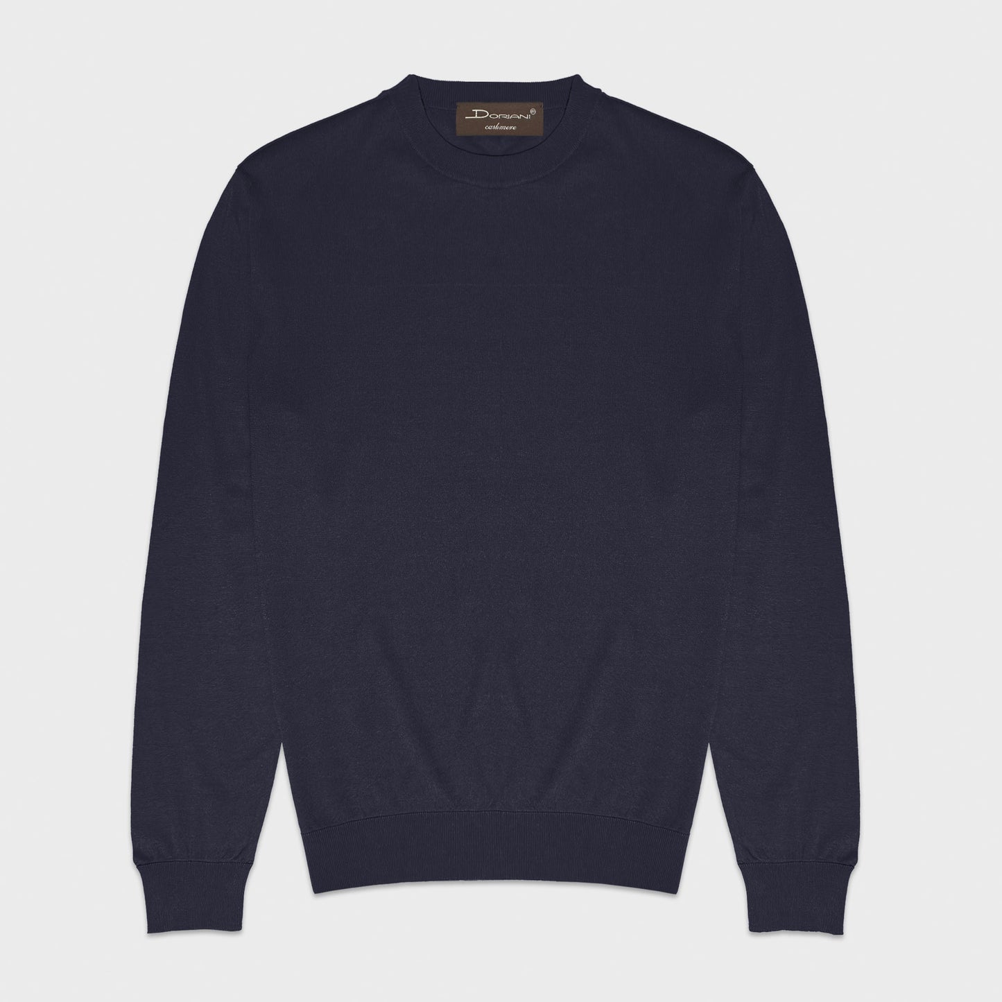 Navy Blue Cotton Long Sleeve Crewneck Made in Italy. Navy blue long sleeve crewneck by Doriani in lightweight 100% cotton. Soft and refined knitwear designed for layering, relaxed tailoring elegance. Selected by Wools Boutique Uomo in Geneva for its balance of comfort, versatility and understated Italian refinement.