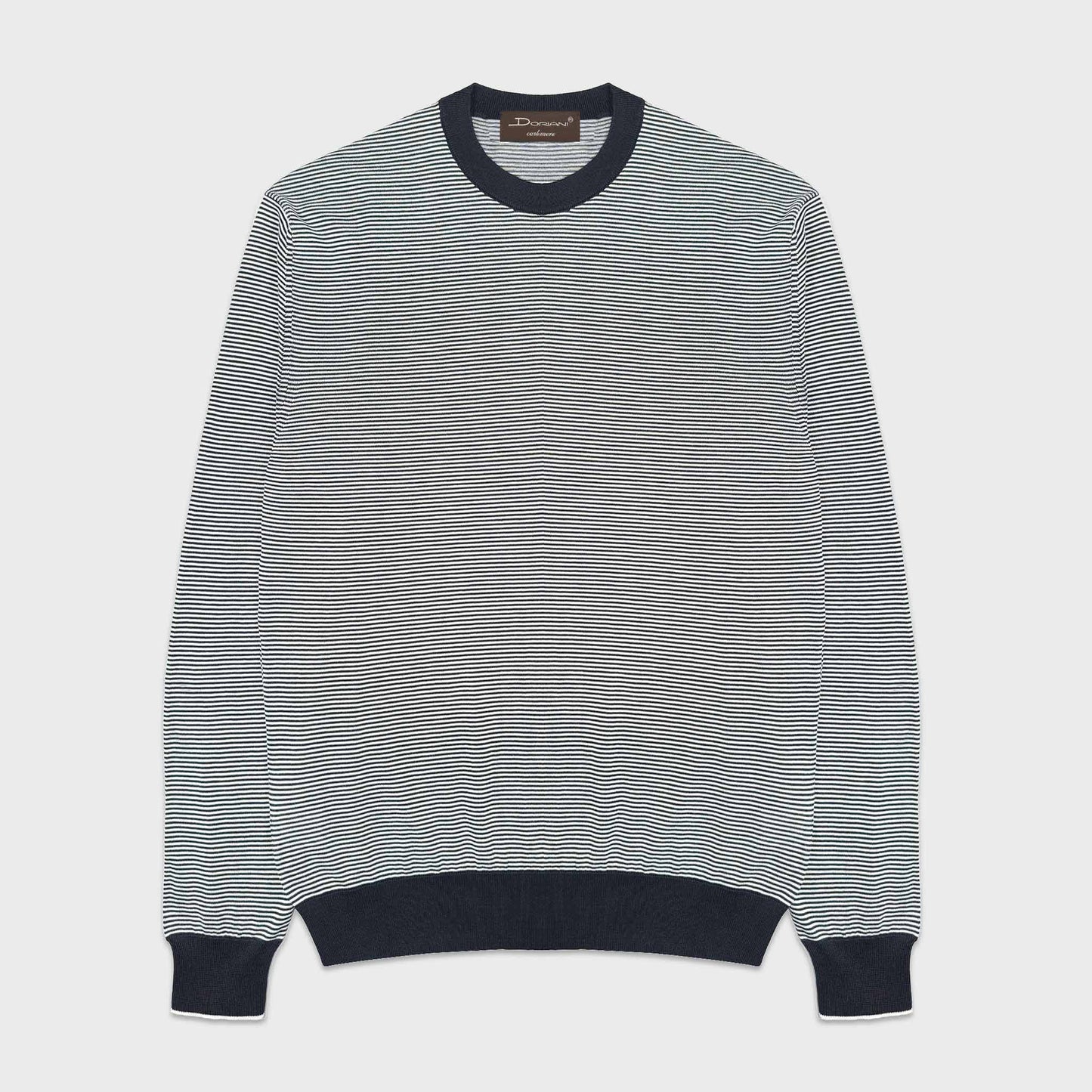 Navy White Silk Cotton Marinière Crewneck Sweater. Navy and white marinière crewneck sweater by Doriani in a refined silk and cotton blend. marinière or tricot rayé, also known as Breton shirt or Breton shirt. Italian-made knitwear inspired by timeless Mediterranean and artistic summer style.  Discover at Wools Boutique Uomo Geneva