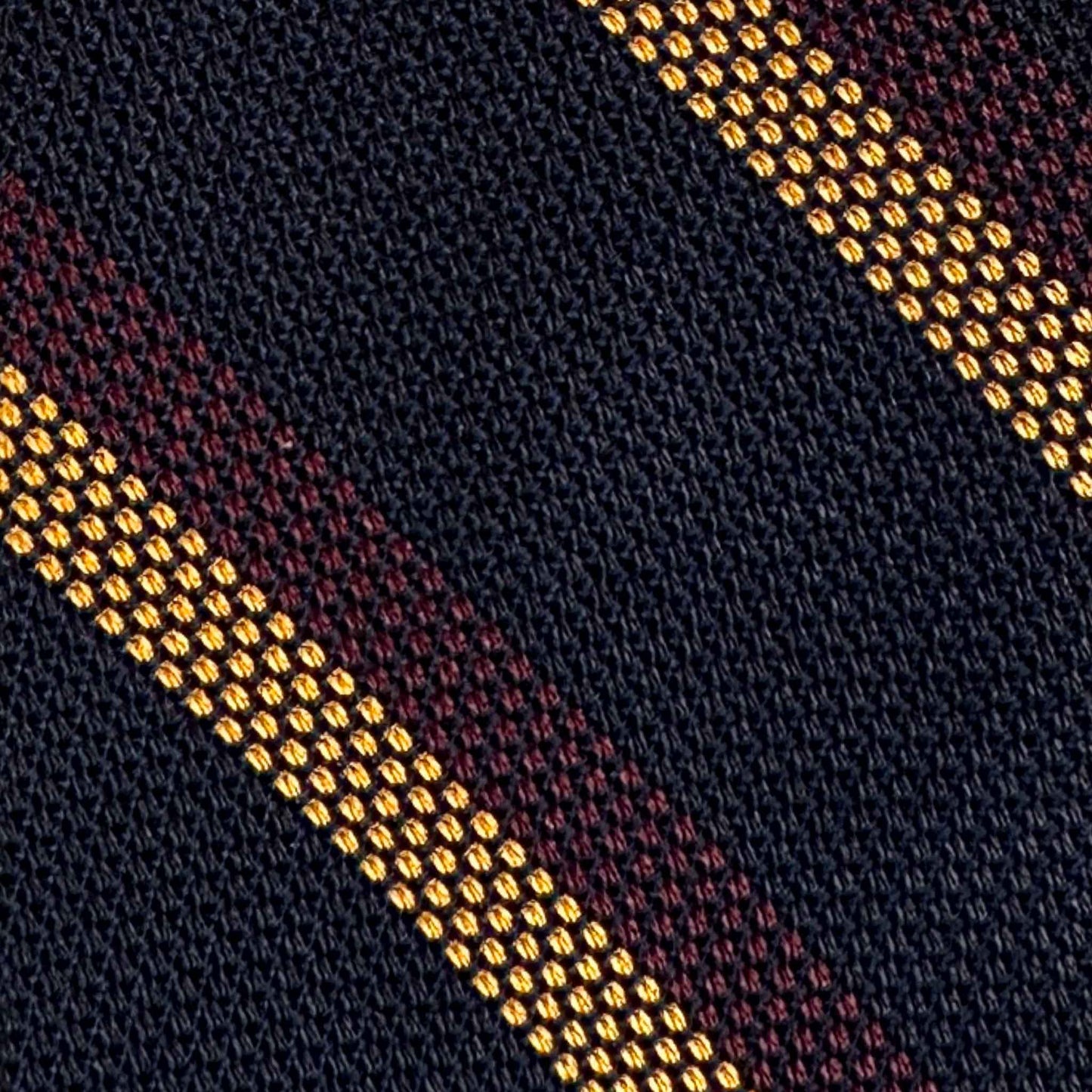 detail of grenadine silk regimental tie navy gold burgundy stripes – made in Italy Naples