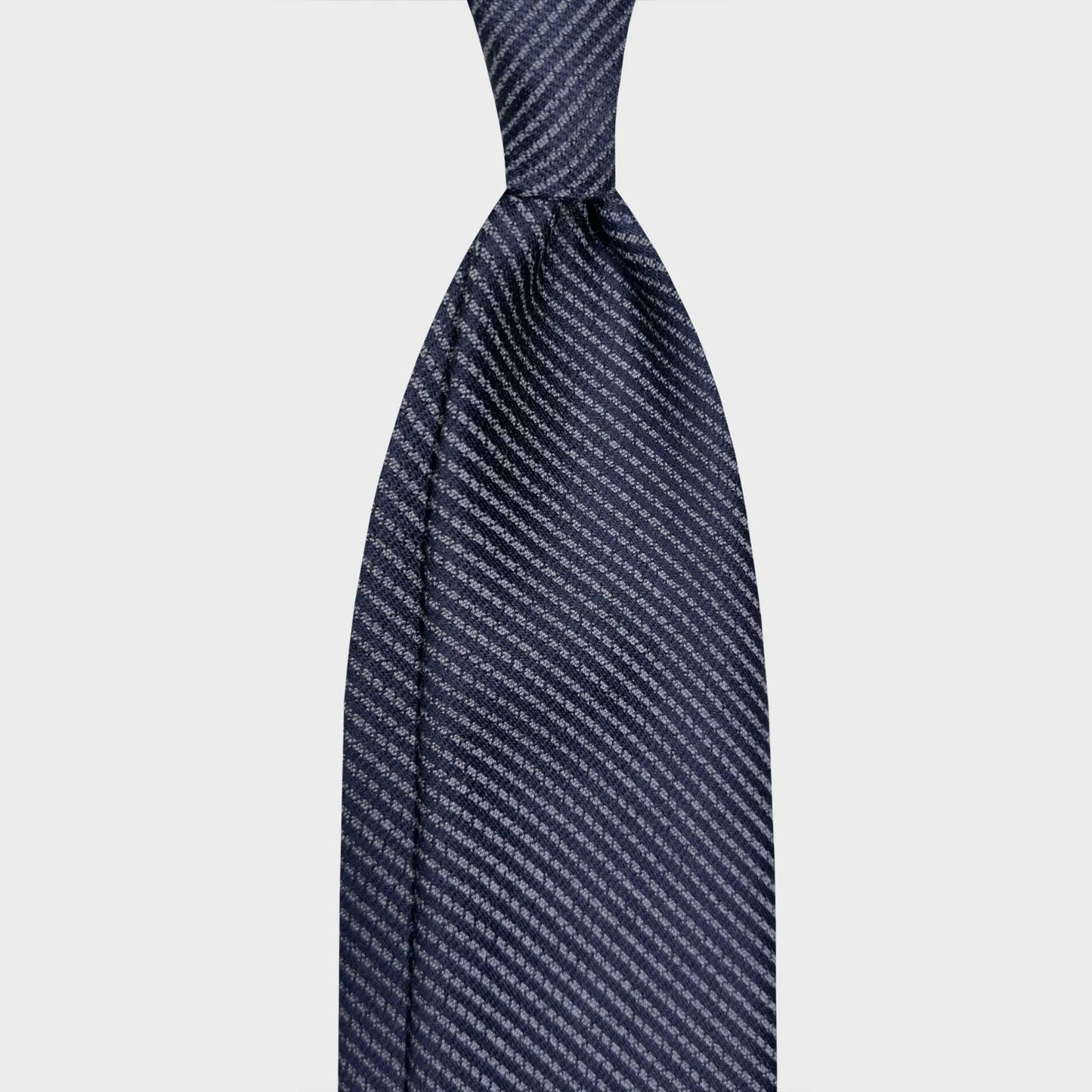 Striped Wool Tie Dark Navy Blue Shop Online. Men's regimental wool tie hand made in Italy F.Marino Napoli exclusive for Wools Boutique Uomo Geneva luxury men's store ties for men in Switzerland