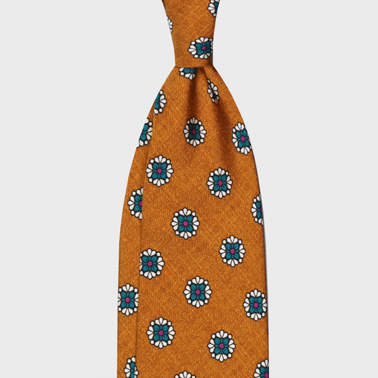 Curry Yellow Silk Tie Unlined Diamonds Flower Pattern. Silk tie flamed curry yellow background with turquoise and white diamonds flower pattern, unlined 3 folds, handmade tie F.Marino Napoli for Wools Boutique Uomo