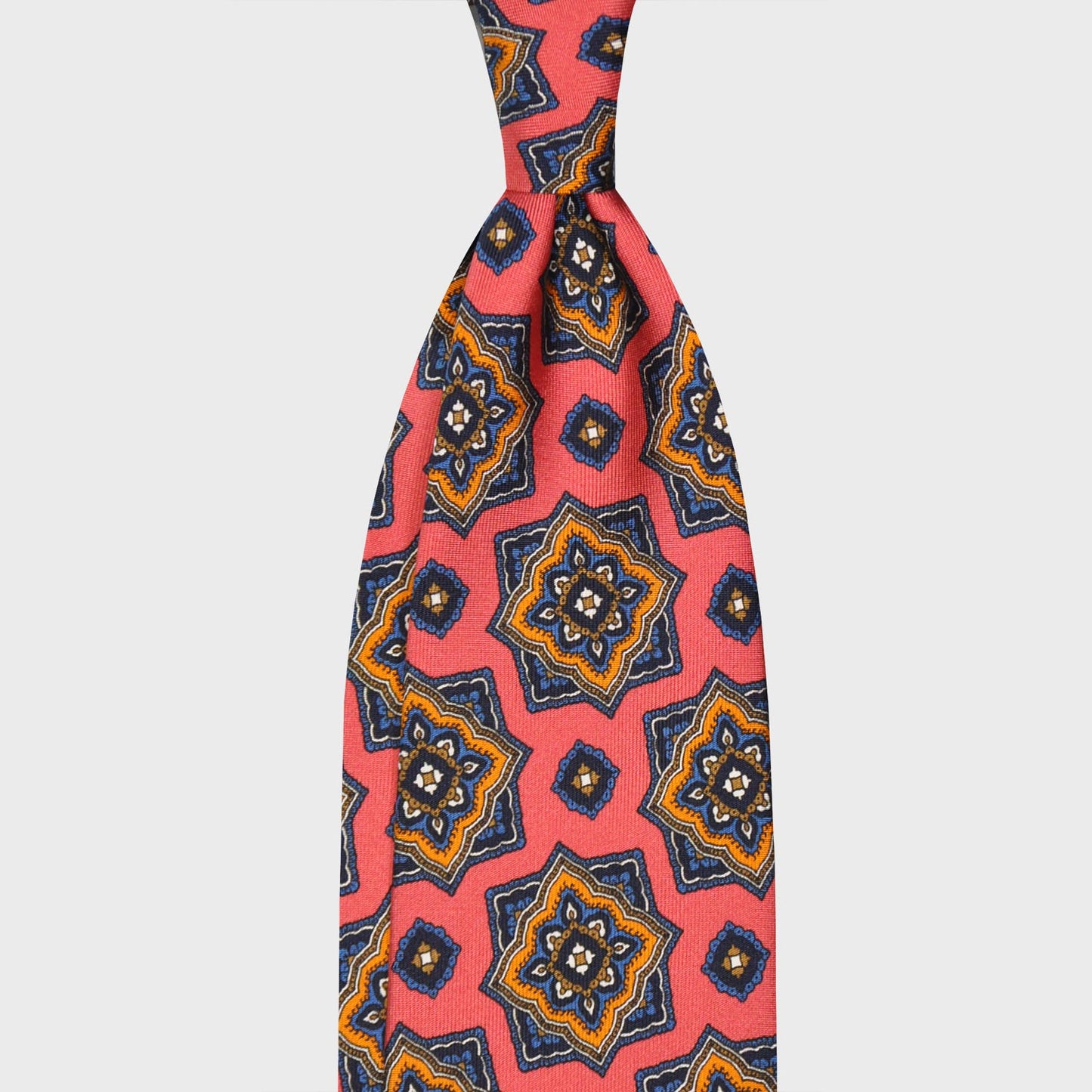 Mandala Pattern Salmon Pink Silk Tie Unlined. Refined mandala pattern salmon pink silk tie, pervinca blue and curry yellow mandala medallions pattern, unlined 3 folds, handmade tie F.Marino Napoli for Wools Boutique Uomo