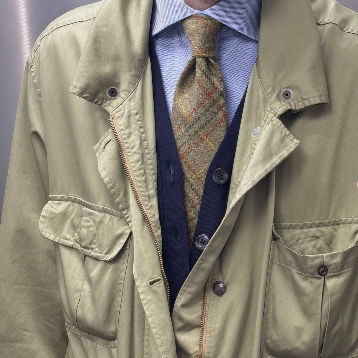 Glen Plaid tweed tie in Army Green styled with light blue shirt, navy cardigan and sage field jacket