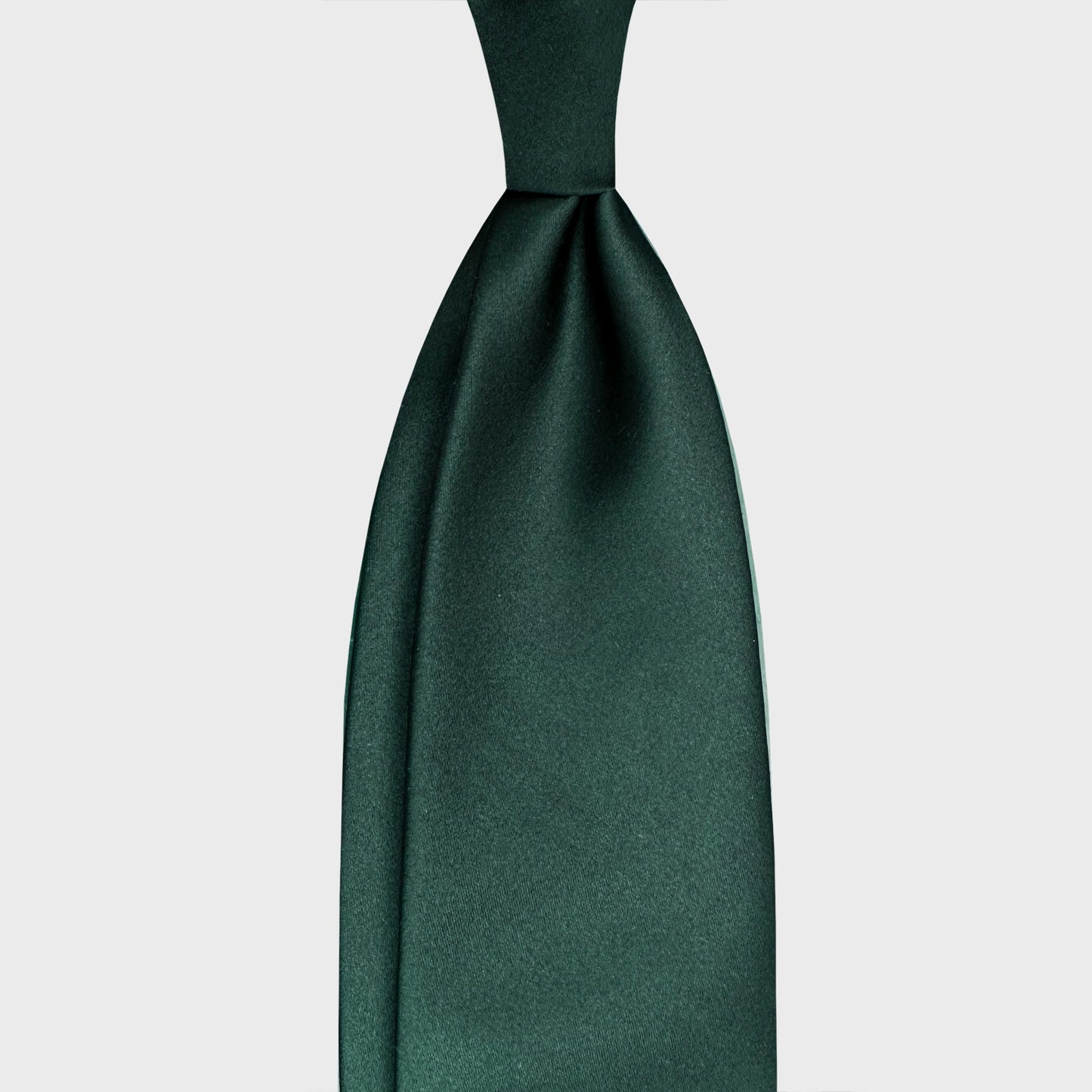 Forest Green Satin Silk Tie Handmade in Italy. Classic green tie made with satin silk, explore collection of handmade men's silk ties Geneva Switzerland, F.Marino black ties exclusive for Wools Boutique Uomo
